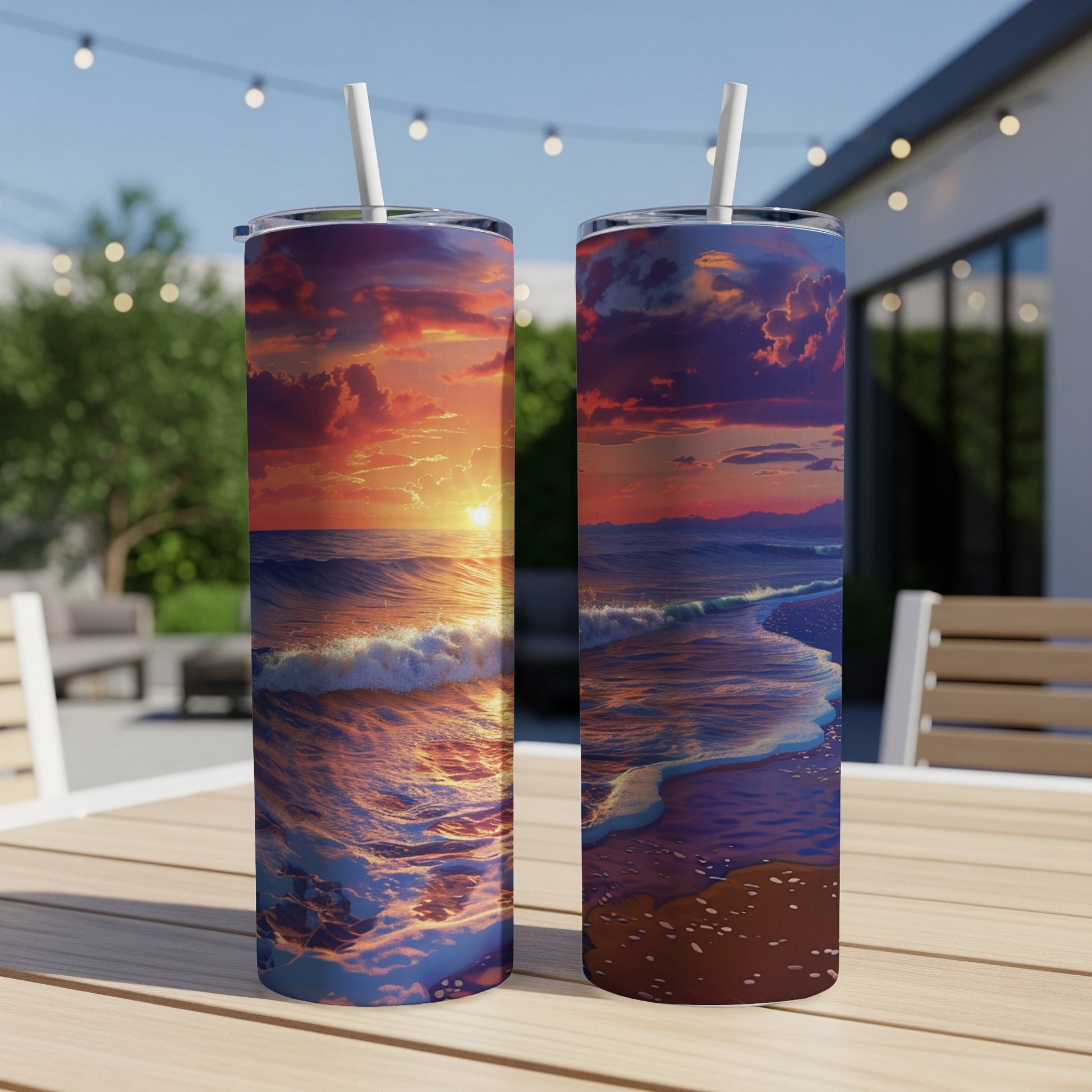 Two tumblers featuring a vibrant sunset over a wavy ocean.
