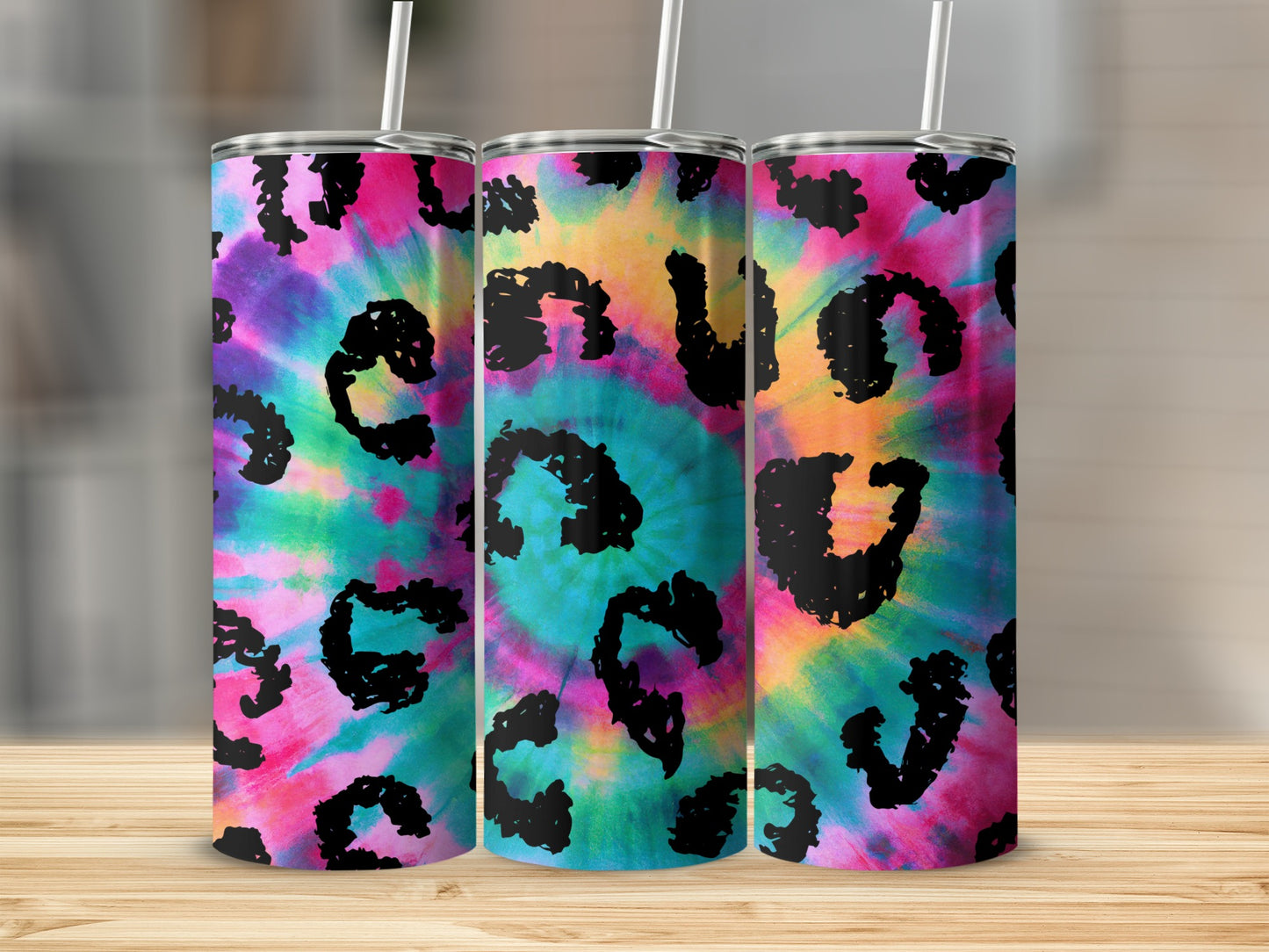 Three tumblers with a black leopard print tie-dye pattern.