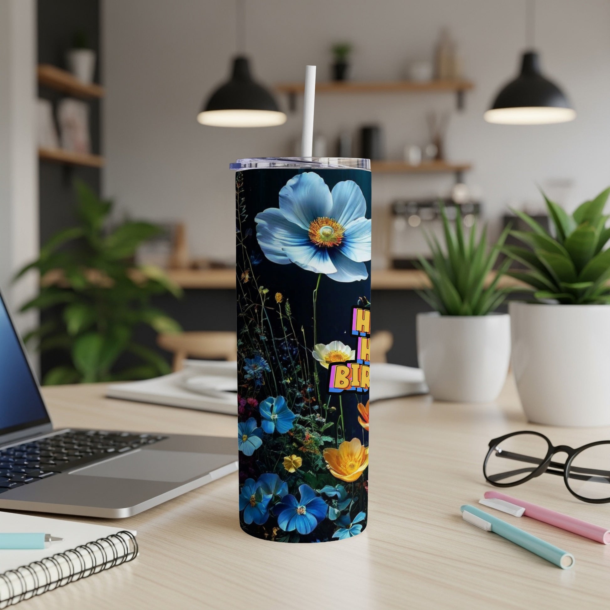 Tall tumbler with flowers and "Happy Birthday" text.