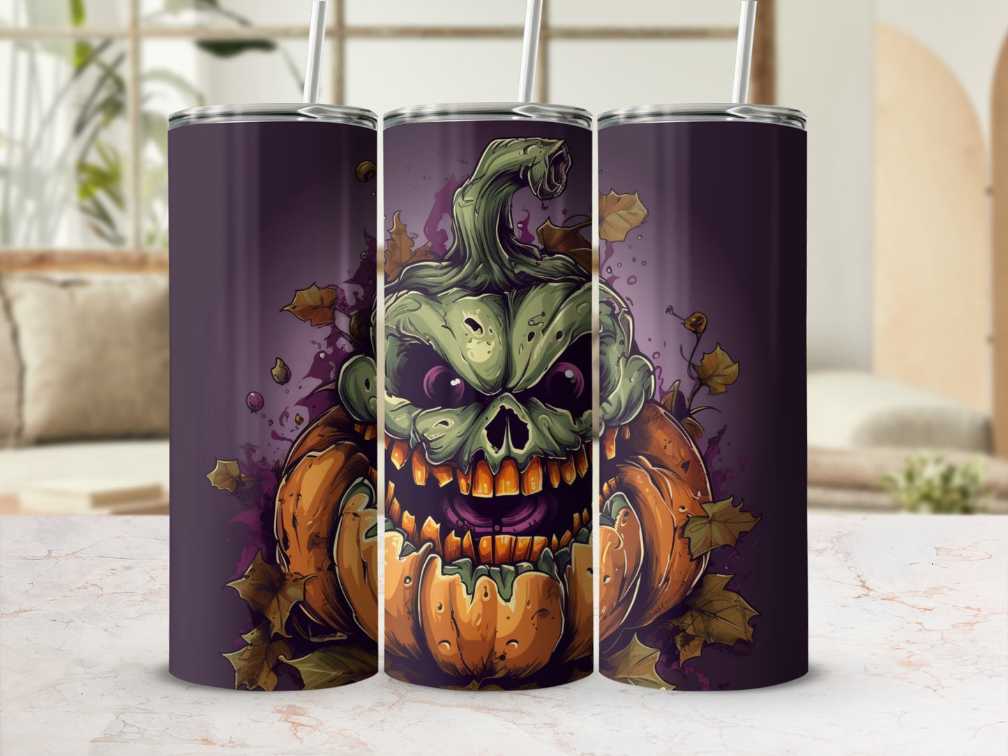 Three tumblers with a green, grinning skull emerging from a jack-o'-lantern.