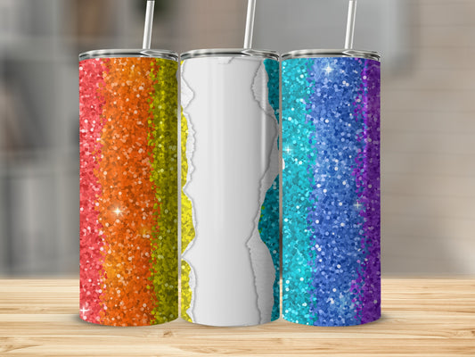 Three glitter tumblers with rainbow sparkle design and torn paper effect.