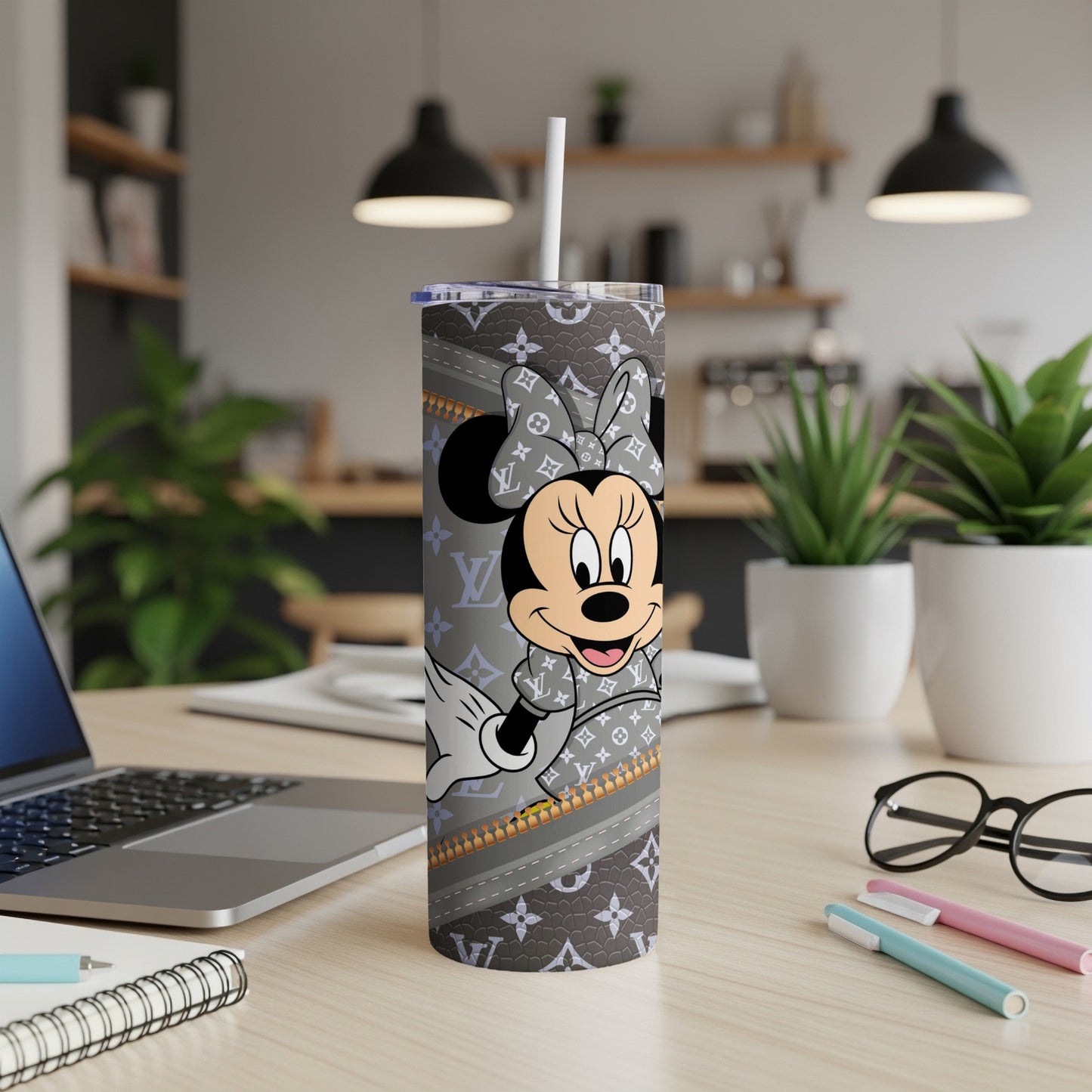 Minnie Mouse tumbler with gray Louis Vuitton-inspired pattern and white straw.