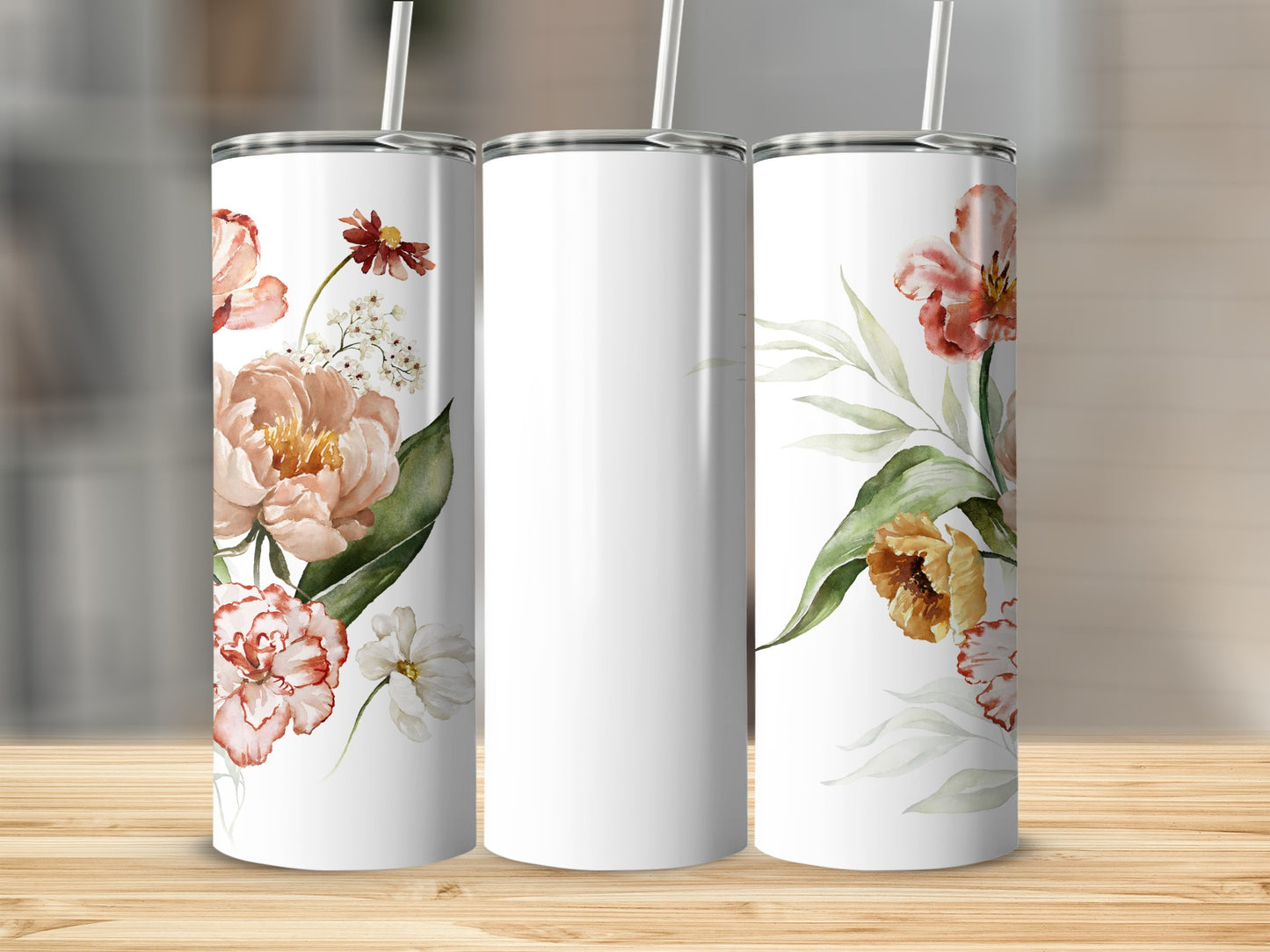 White tumblers with watercolor floral designs on left and right.