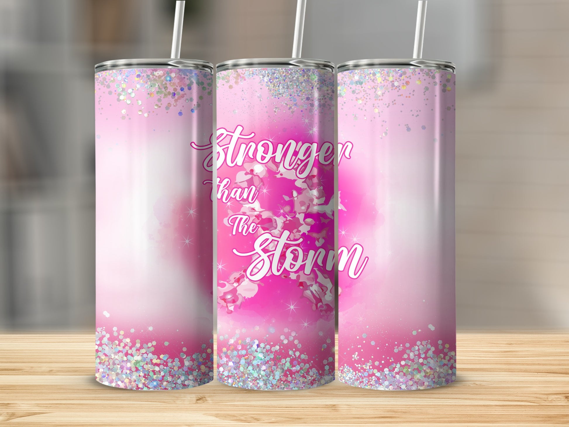 Pink glitter tumbler with "Stronger than the Storm" text.