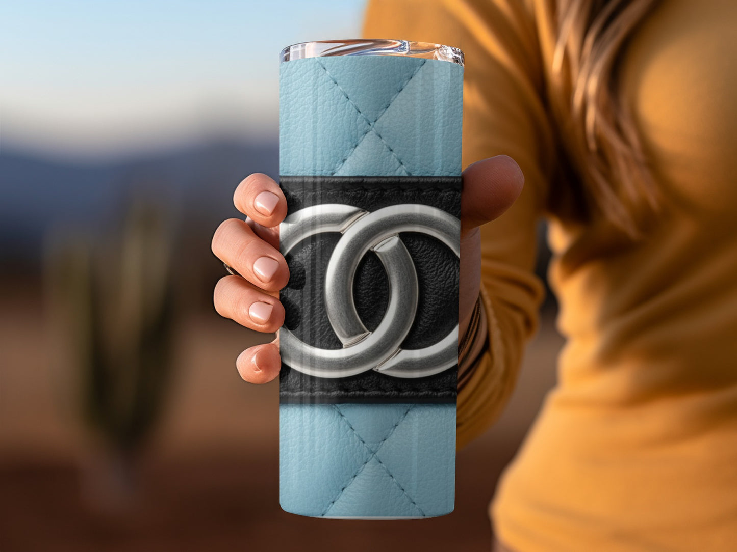 Light Blue Quilted Surface Black Band Silver Logo Tumblers