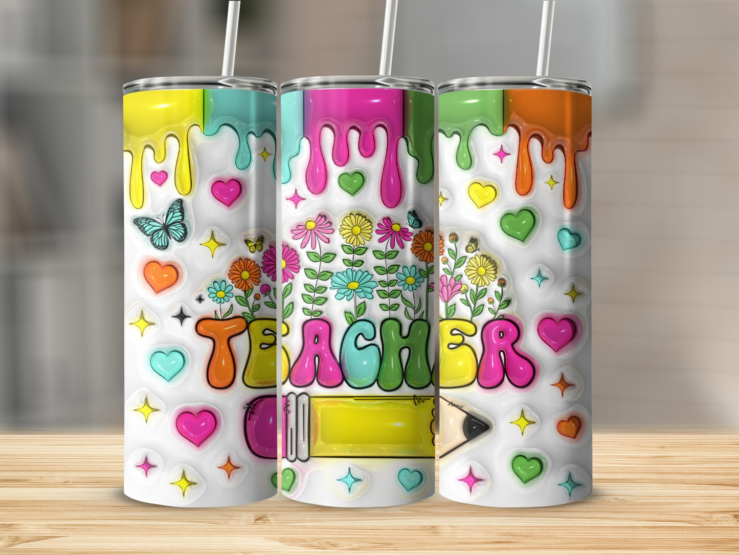 Teacher tumbler with colorful dripping paint, flowers, hearts, stars, and butterflies.