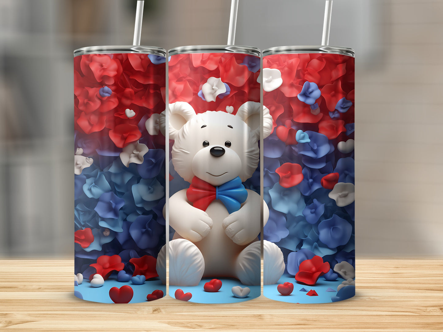 White teddy bear with red, white, and blue floral background on tumblers.