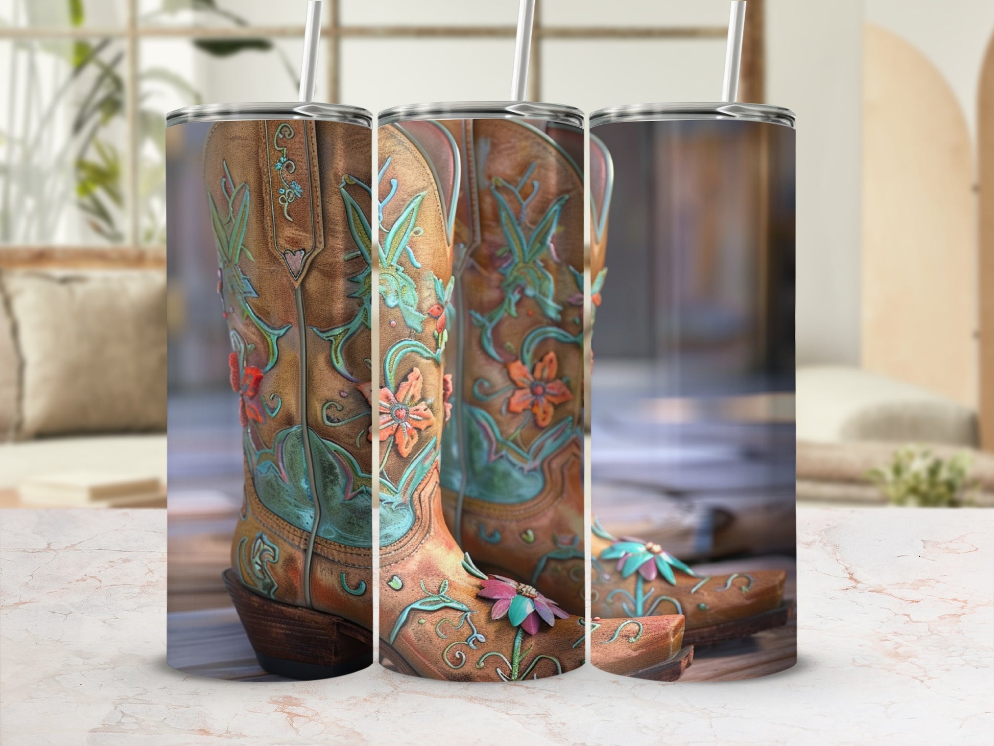 Three leather cowboy boots with floral embroidery and decorative studs.