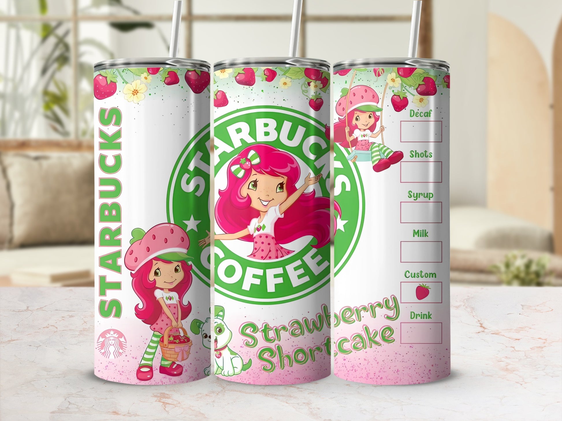 Strawberry Shortcake Starbucks tumbler with colorful illustrations.