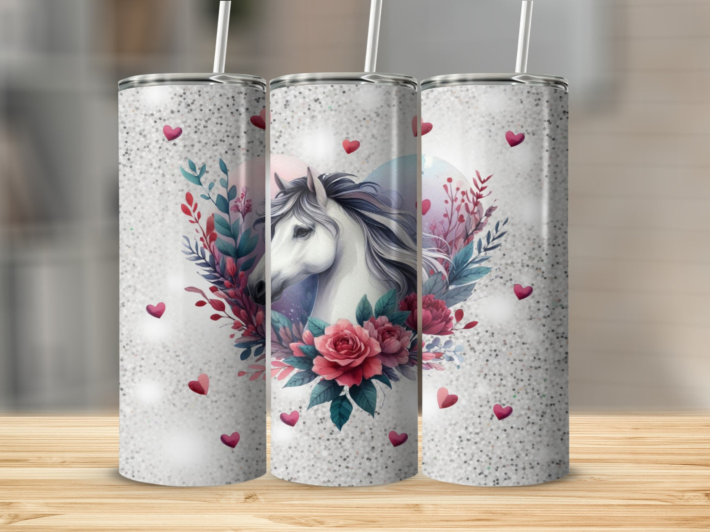 White unicorn with flowers and hearts on a glittery tumbler.