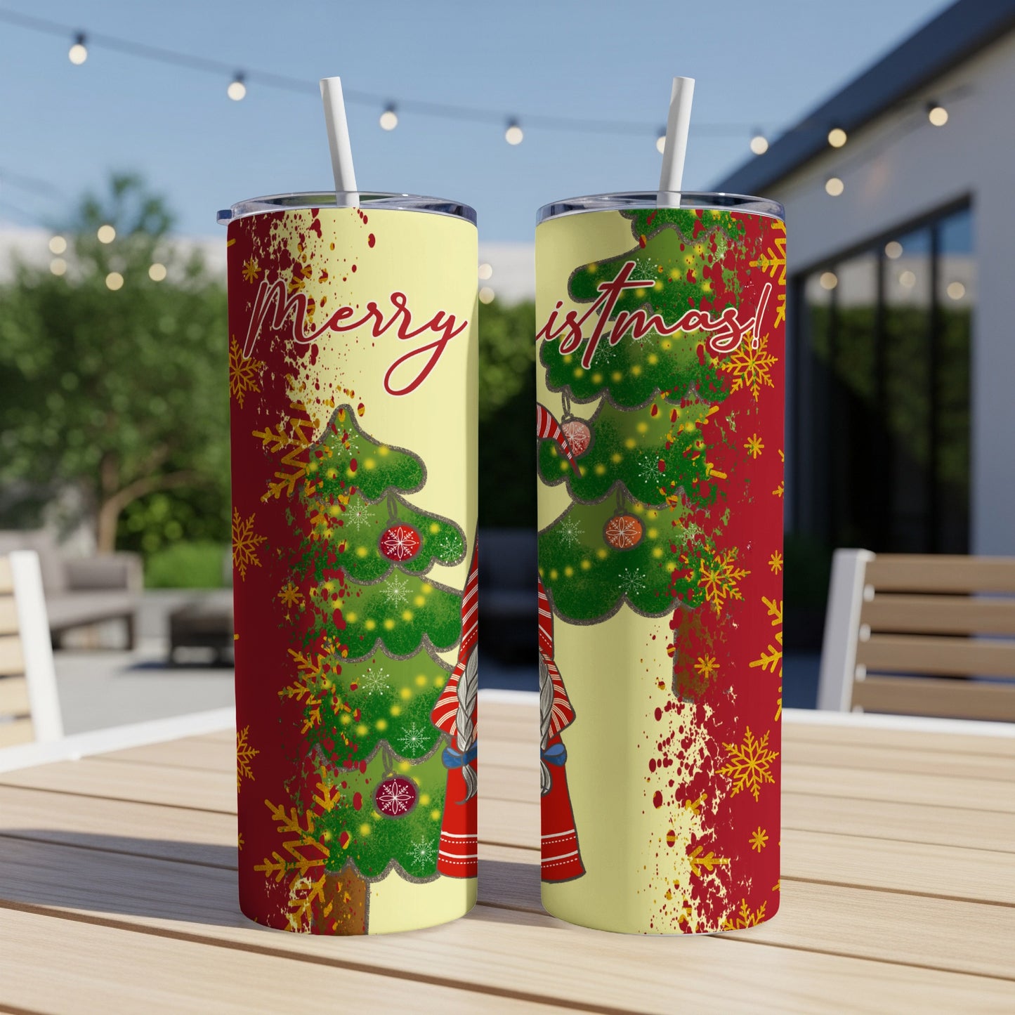 Two tumblers with a Christmas tree, gnome, and "Merry Christmas!" text.