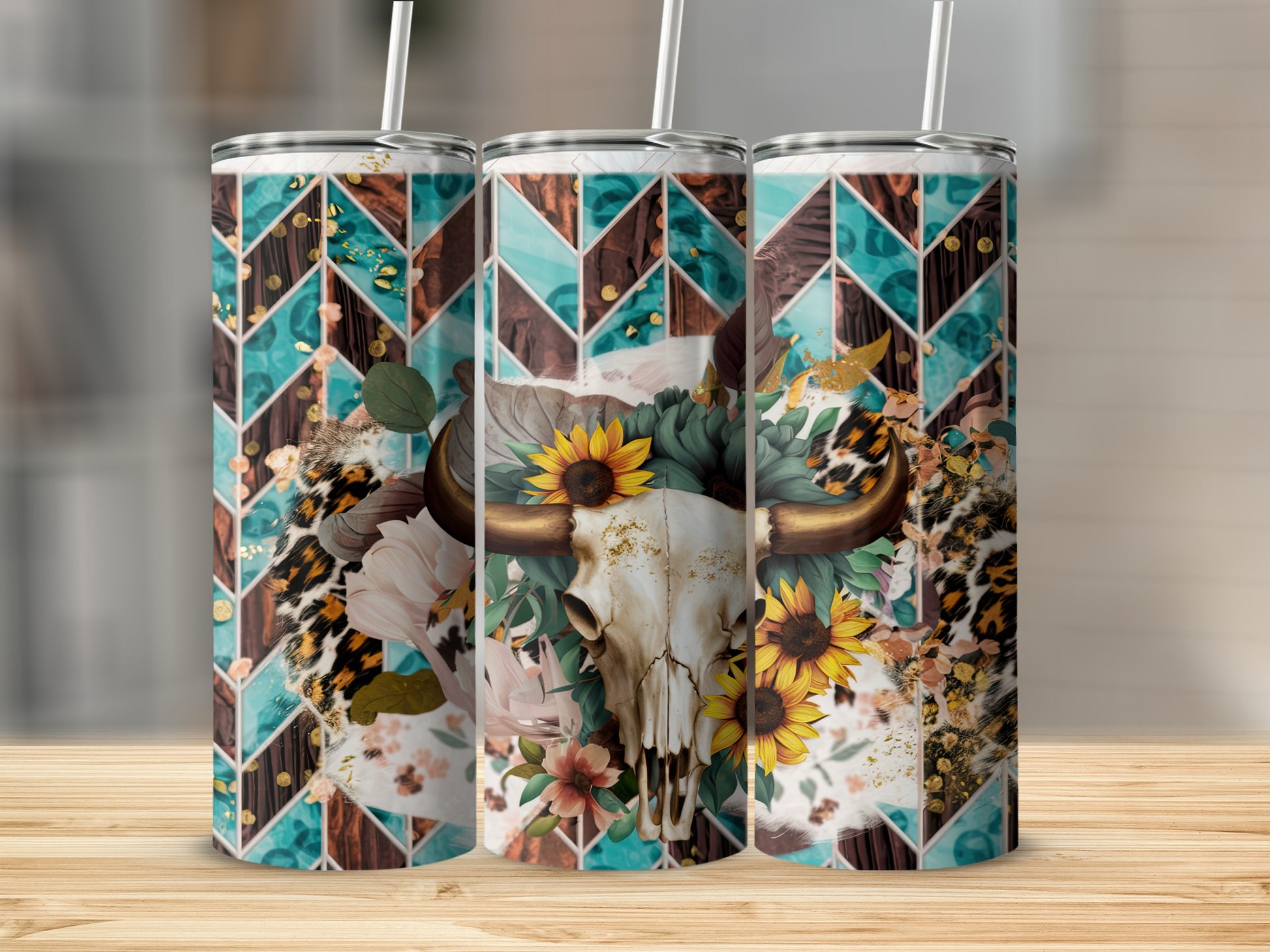 Three tumblers with cow skull, sunflowers, and geometric patterns.