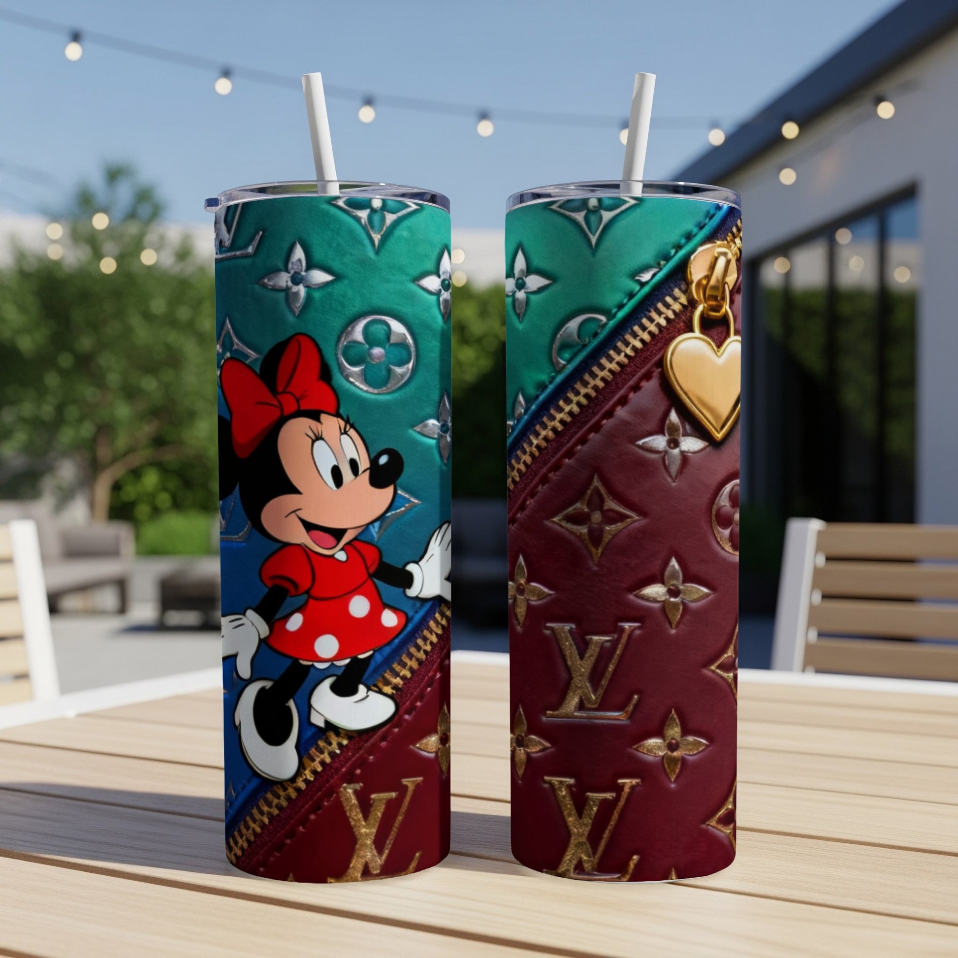Minnie Mouse on a designer patterned tumbler with a zipper detail.