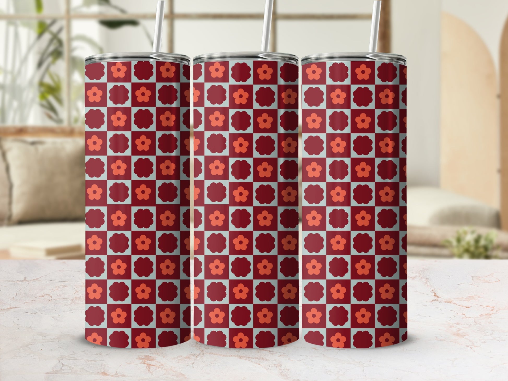 Three tumblers with a retro floral pattern in red and teal.