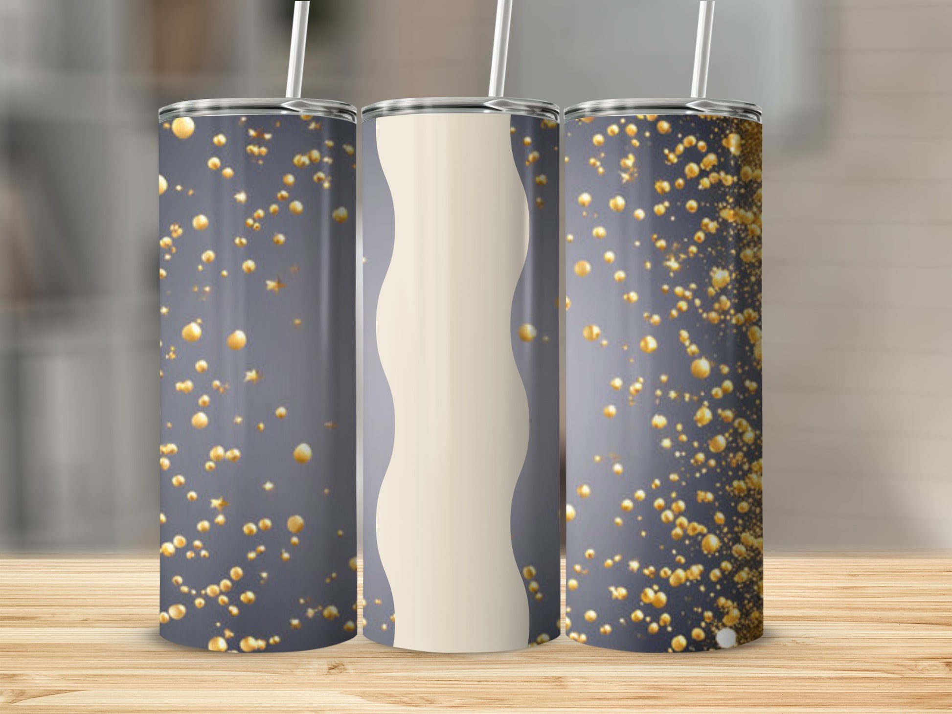 Three tumblers with gold confetti on a wooden surface.