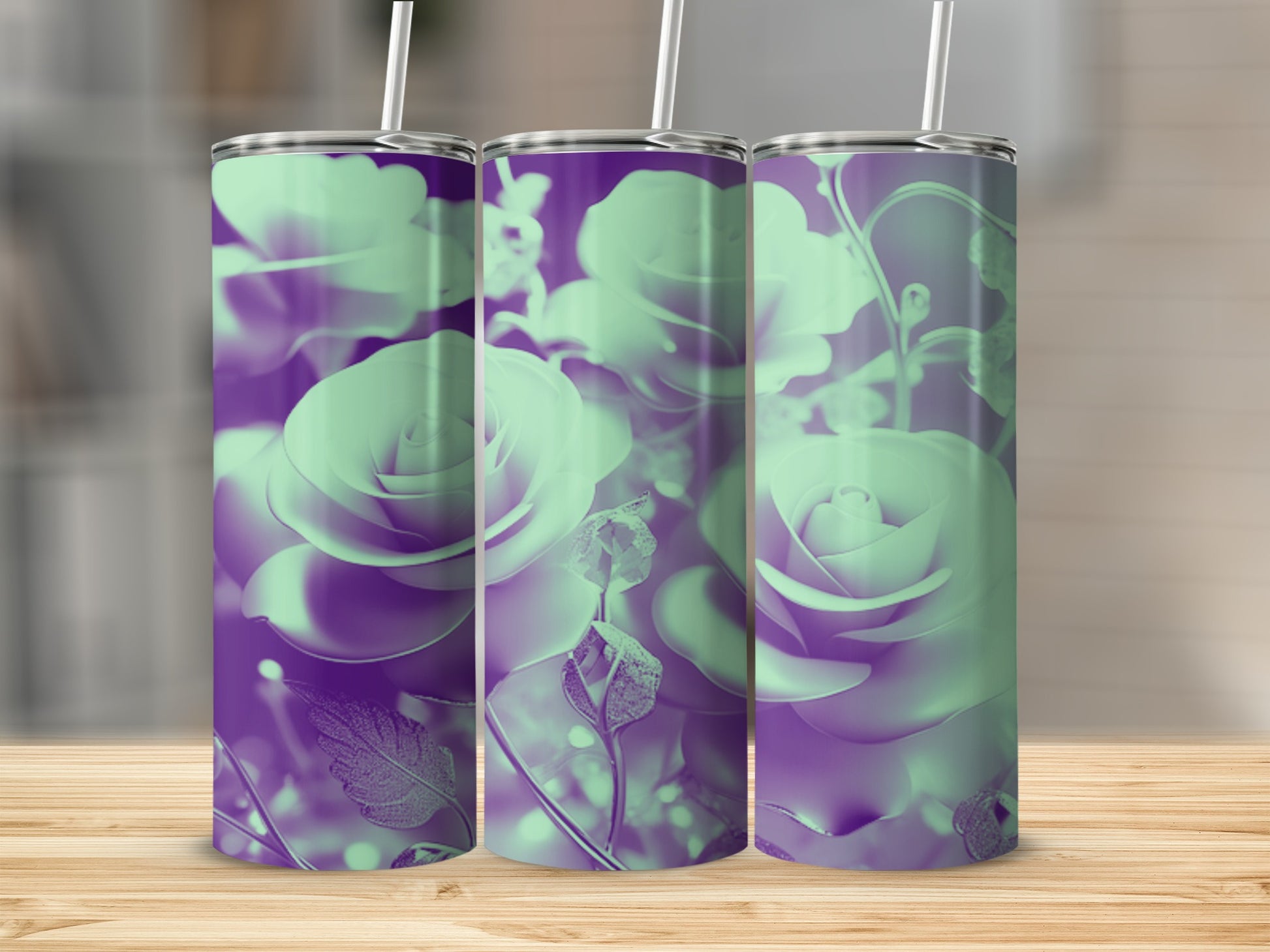 Three tall, slim tumblers with a light green floral pattern on a purple background.