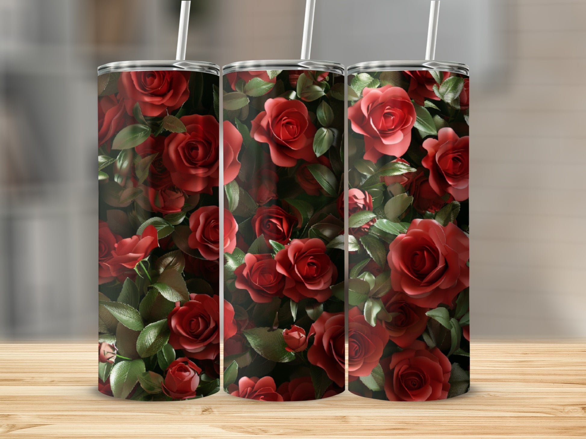 Three tumblers with a dense, all-over pattern of red roses.