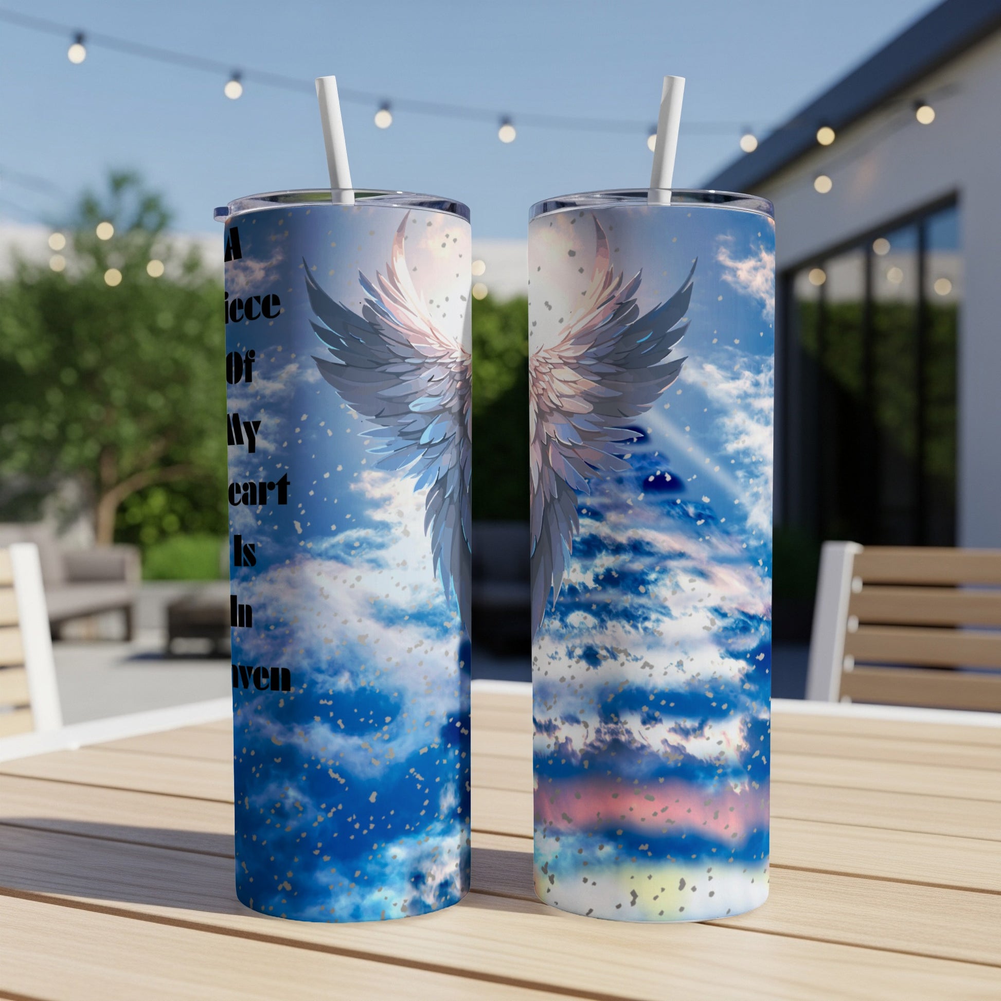 Angel wings over clouds with text "A piece of my heart is given".