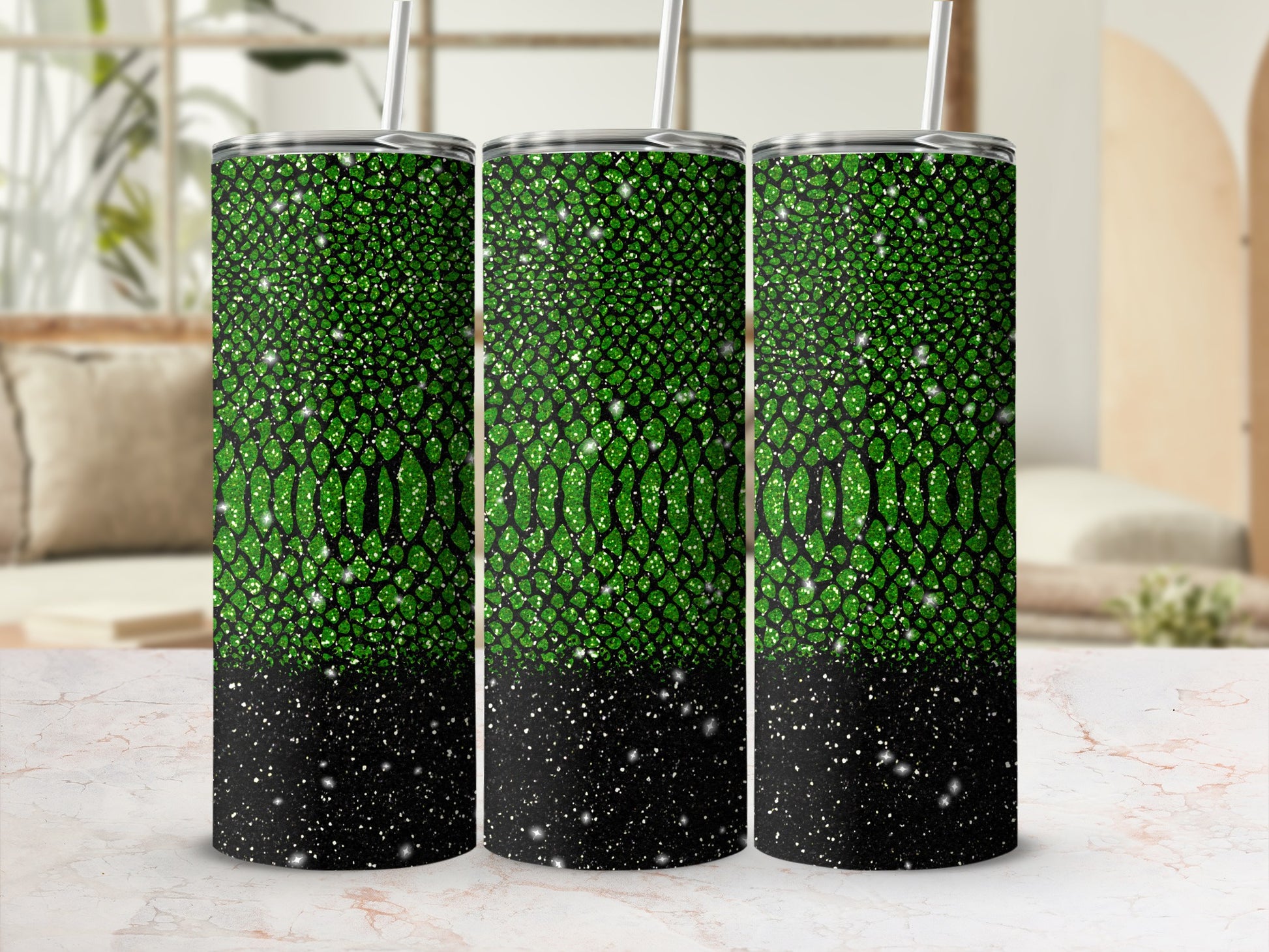 Three glitter tumblers with green and black speckled design.