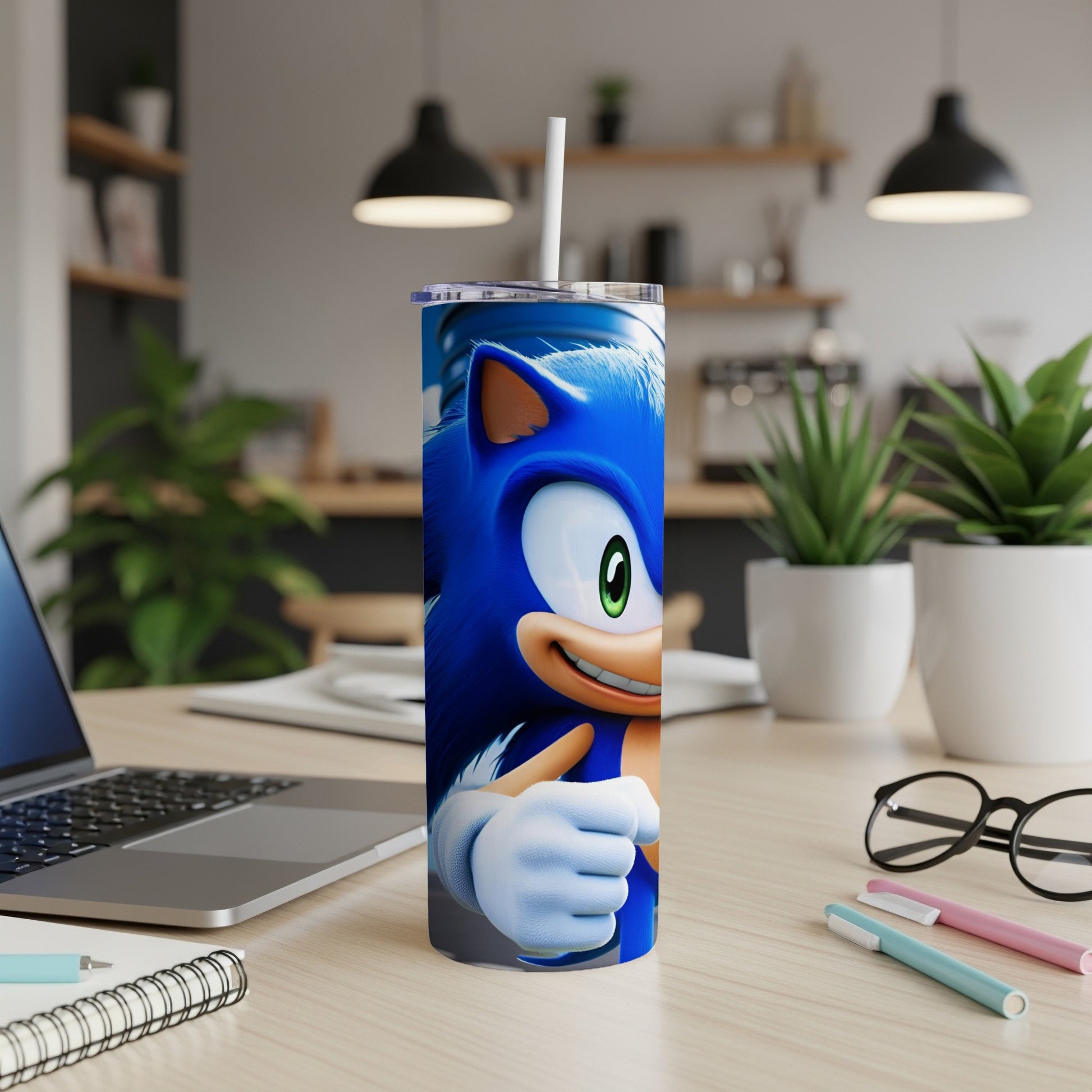 Sonic the Hedgehog tumbler with straw on a desk.