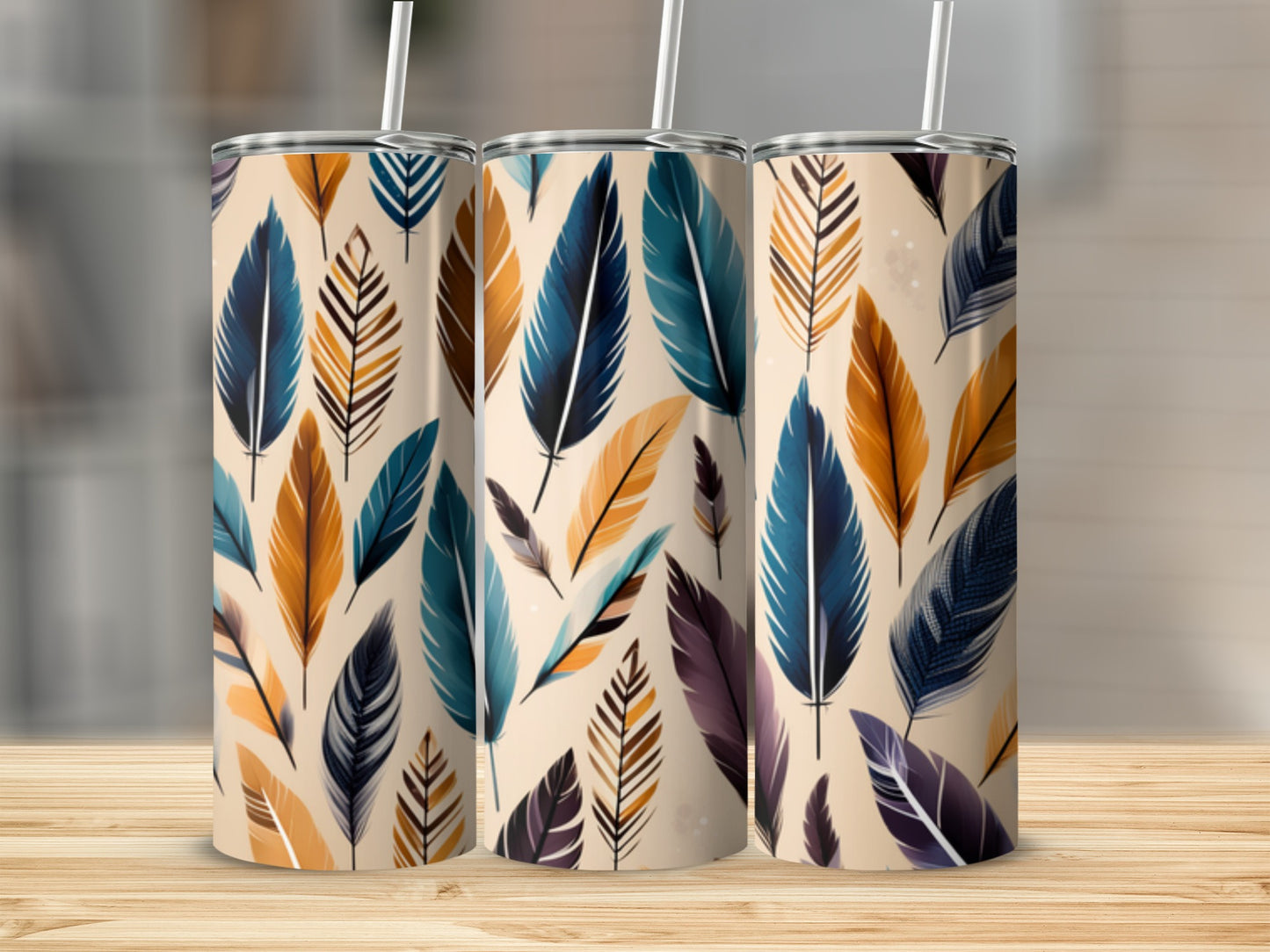 Three tumblers with a repeating pattern of colorful feathers.