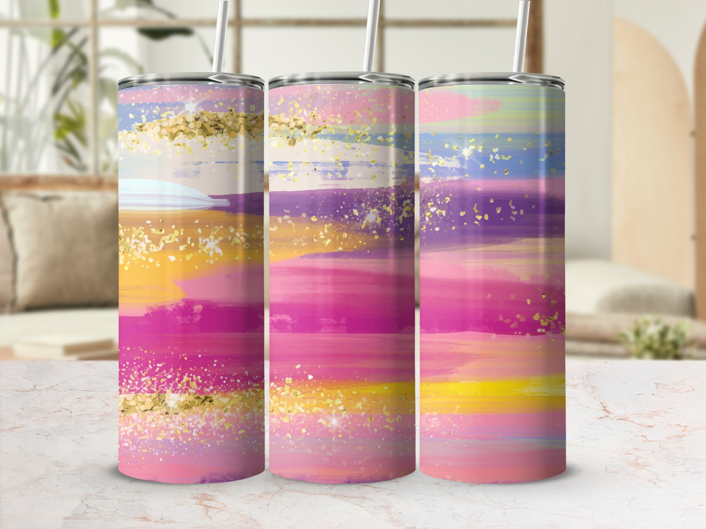 Three tumblers with abstract pink, purple, yellow, and blue brushstrokes and gold glitter.