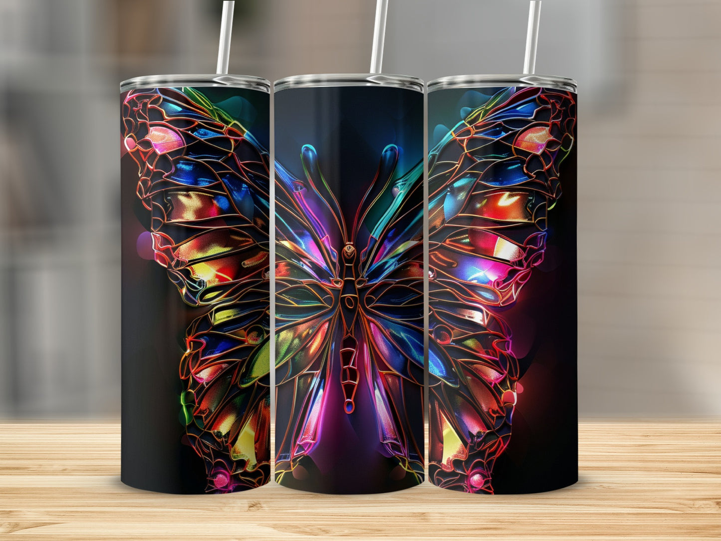 Three tall tumblers featuring a colorful stained-glass butterfly design.