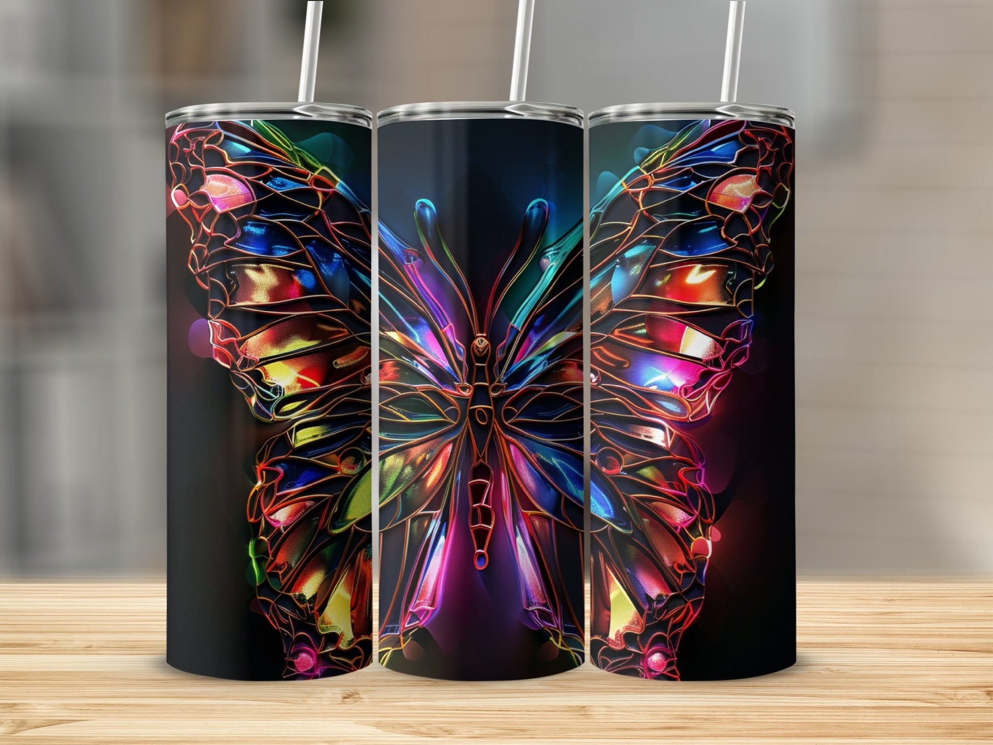 Three tall tumblers featuring a colorful stained-glass butterfly design.