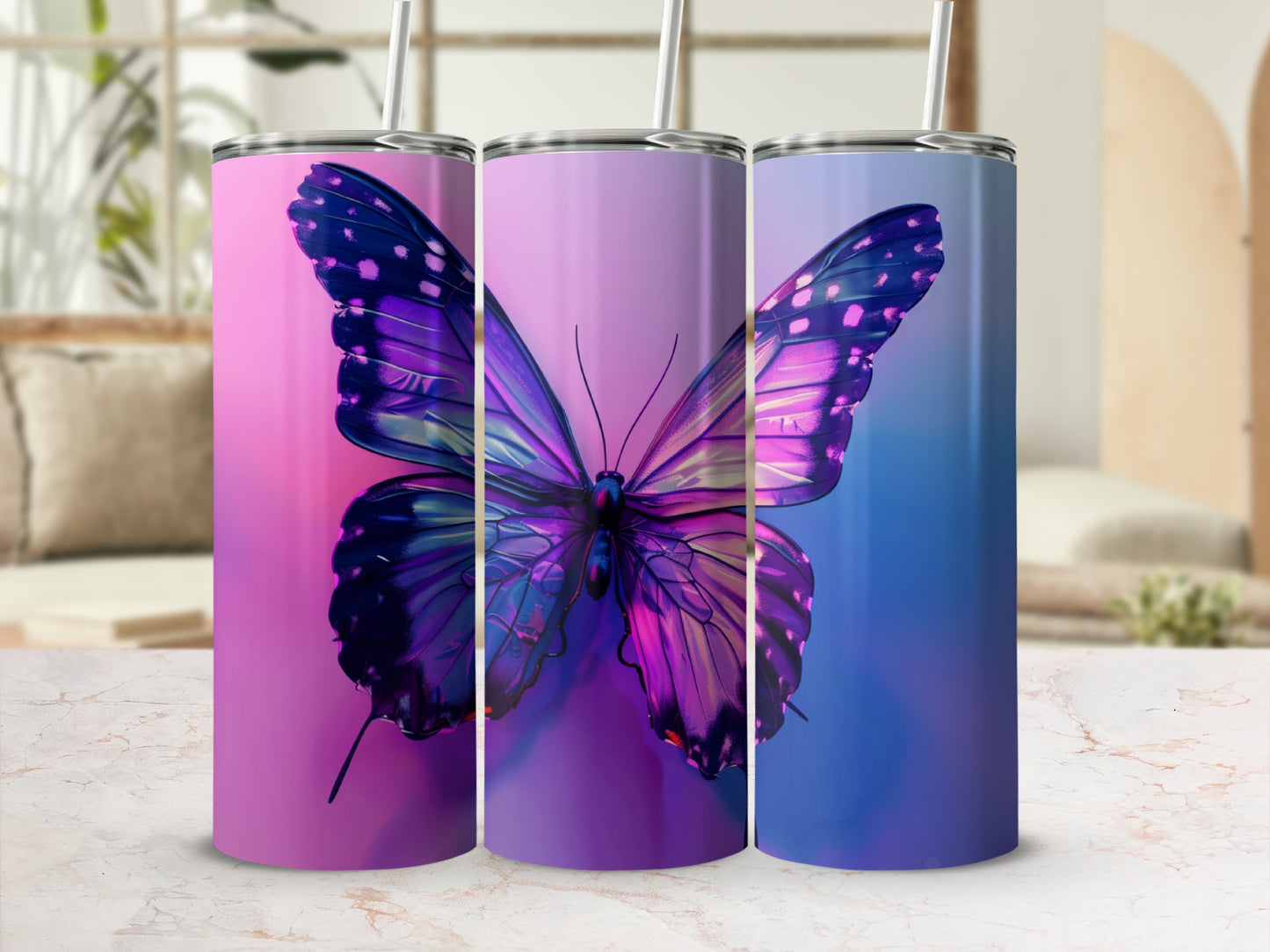 Three tumblers featuring a vibrant purple and blue butterfly design.