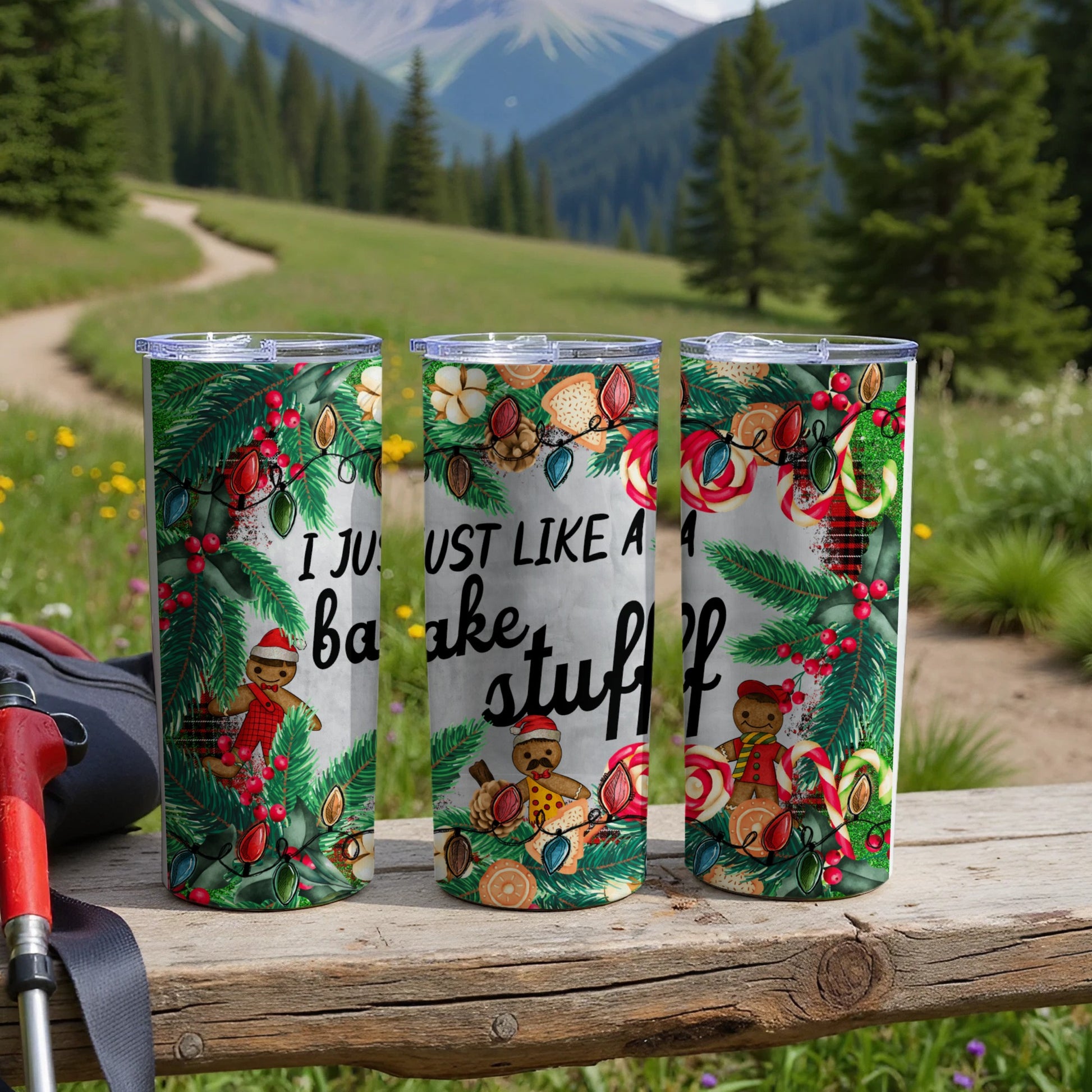 Three tumblers with gingerbread man and Christmas lights design.