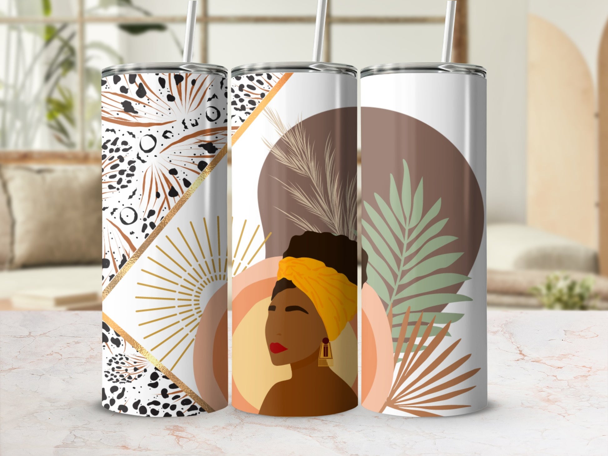 Three tumblers with patterned designs and a woman's profile.