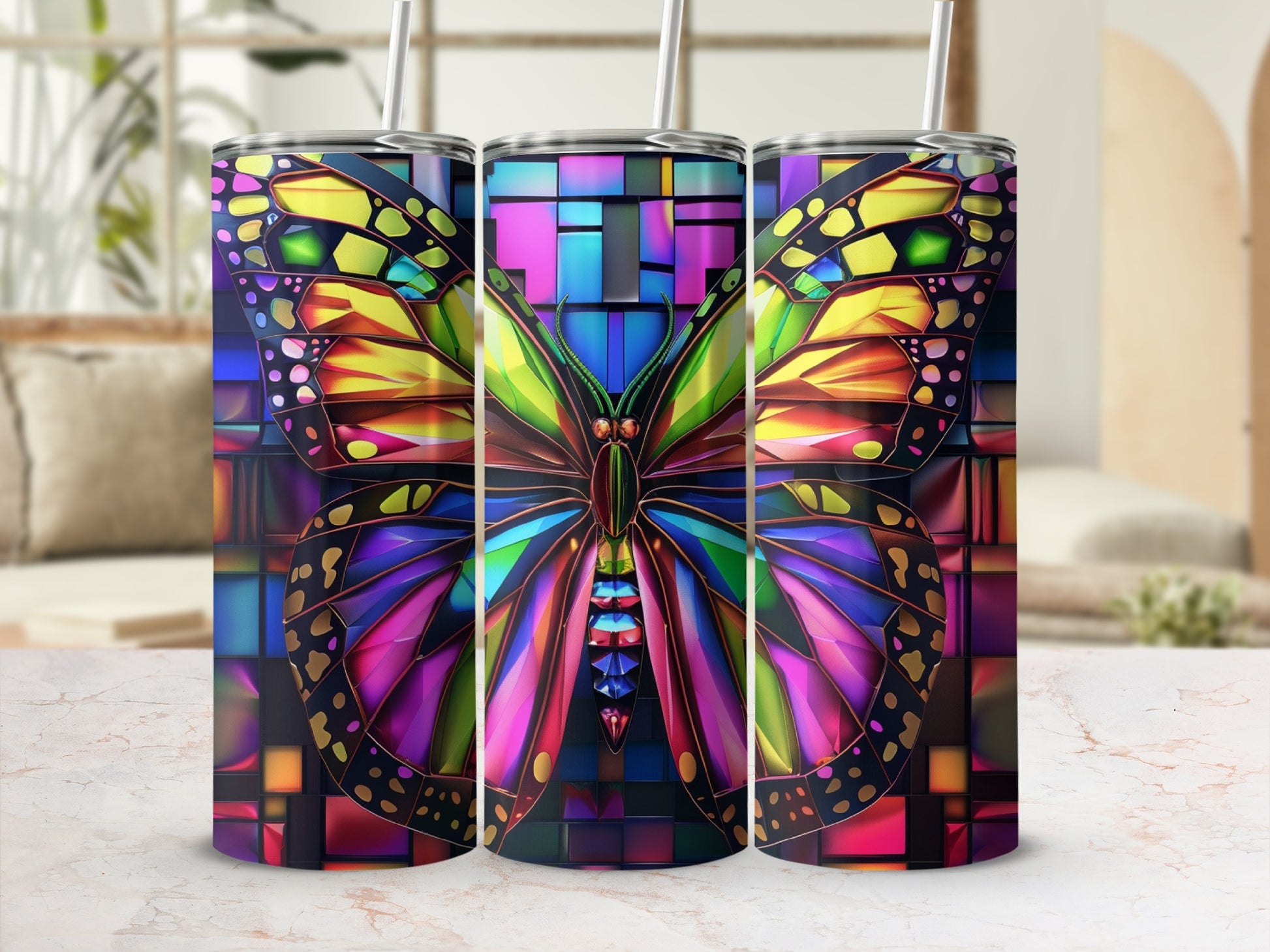 Three tumblers with colorful stained-glass butterfly design.