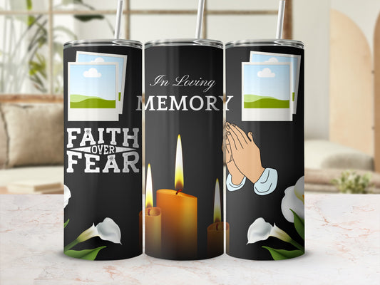 Black tumbler with "In Loving Memory," praying hands, candles, flowers, and "Faith Over Fear."