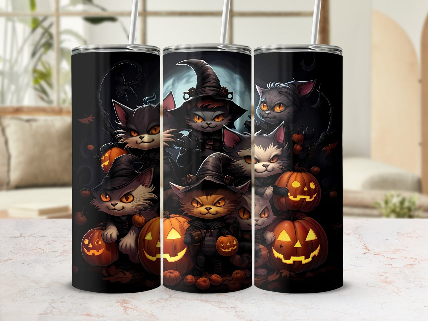 Three tumblers with cartoon cats wearing witch hats and holding jack-o'-lanterns.