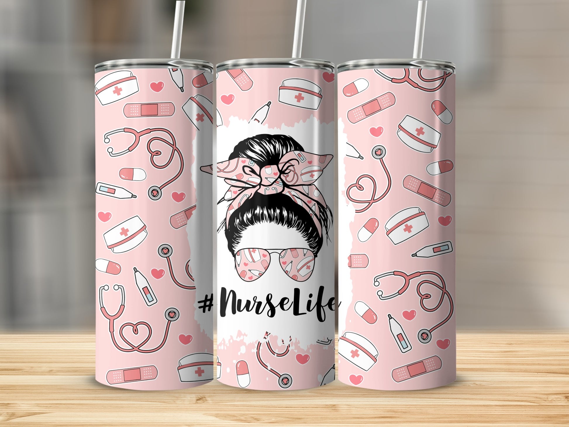 Pink tumbler with medical icons and #NurseLife design.