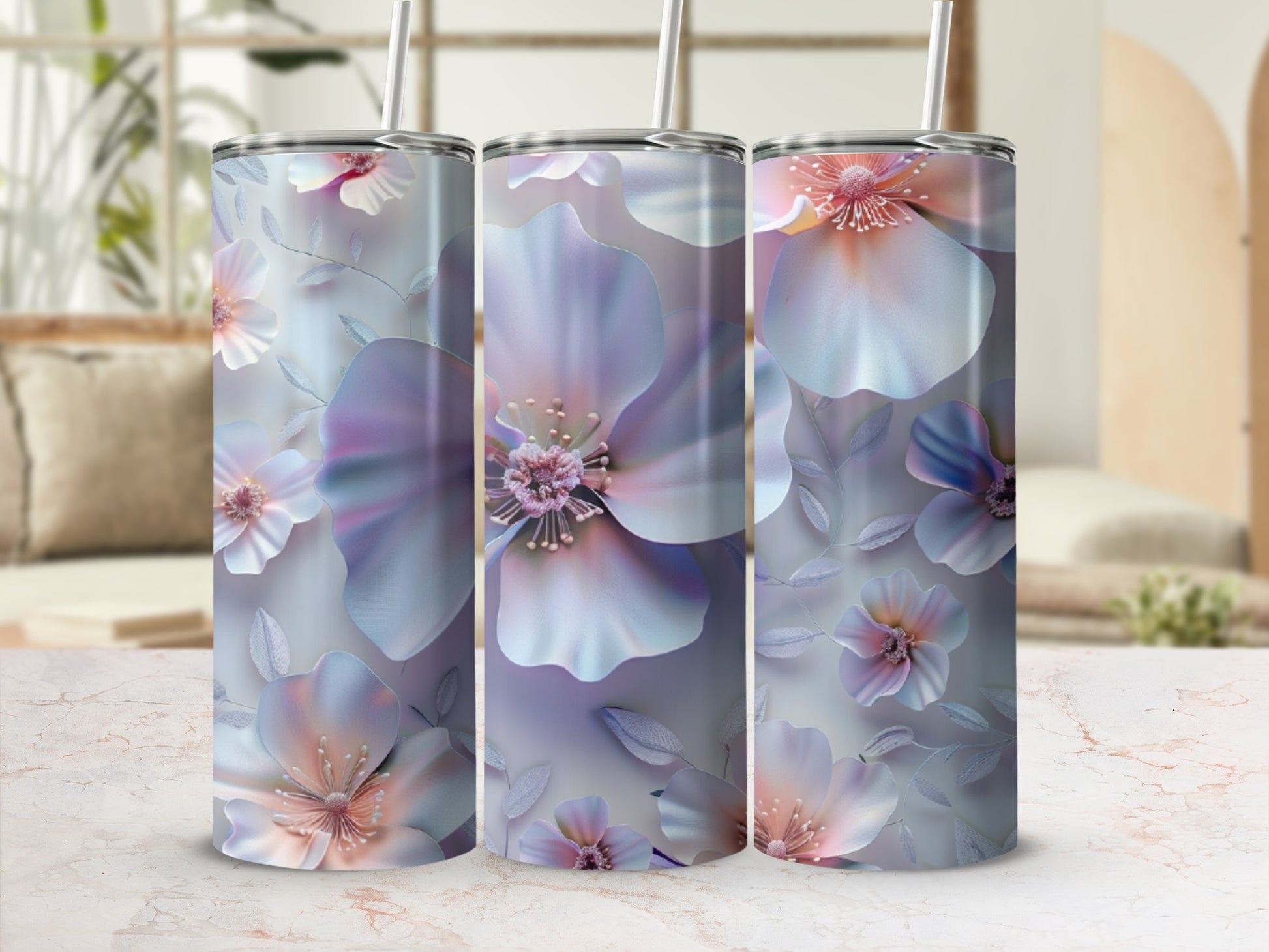 Floral tumbler with pastel petals and leaves on a marble surface.