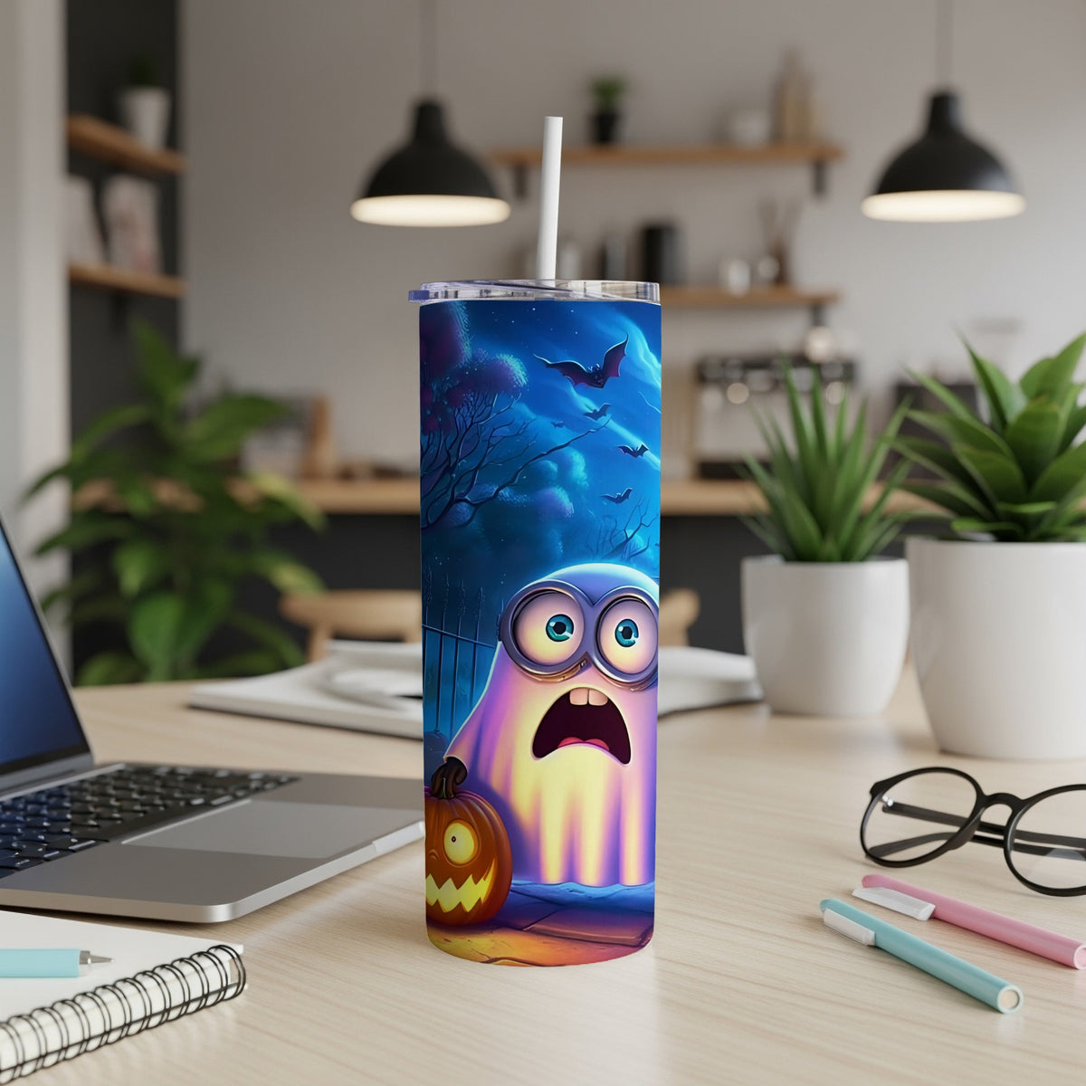 Minion ghost with pumpkin and bats on a Halloween tumbler with straw.