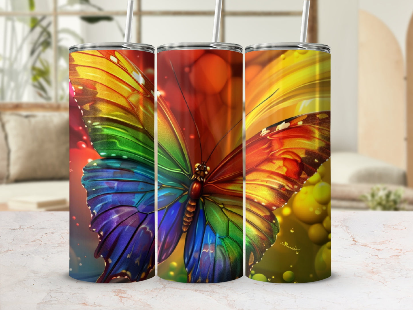 Rainbow butterfly tumbler with blurred floral background.