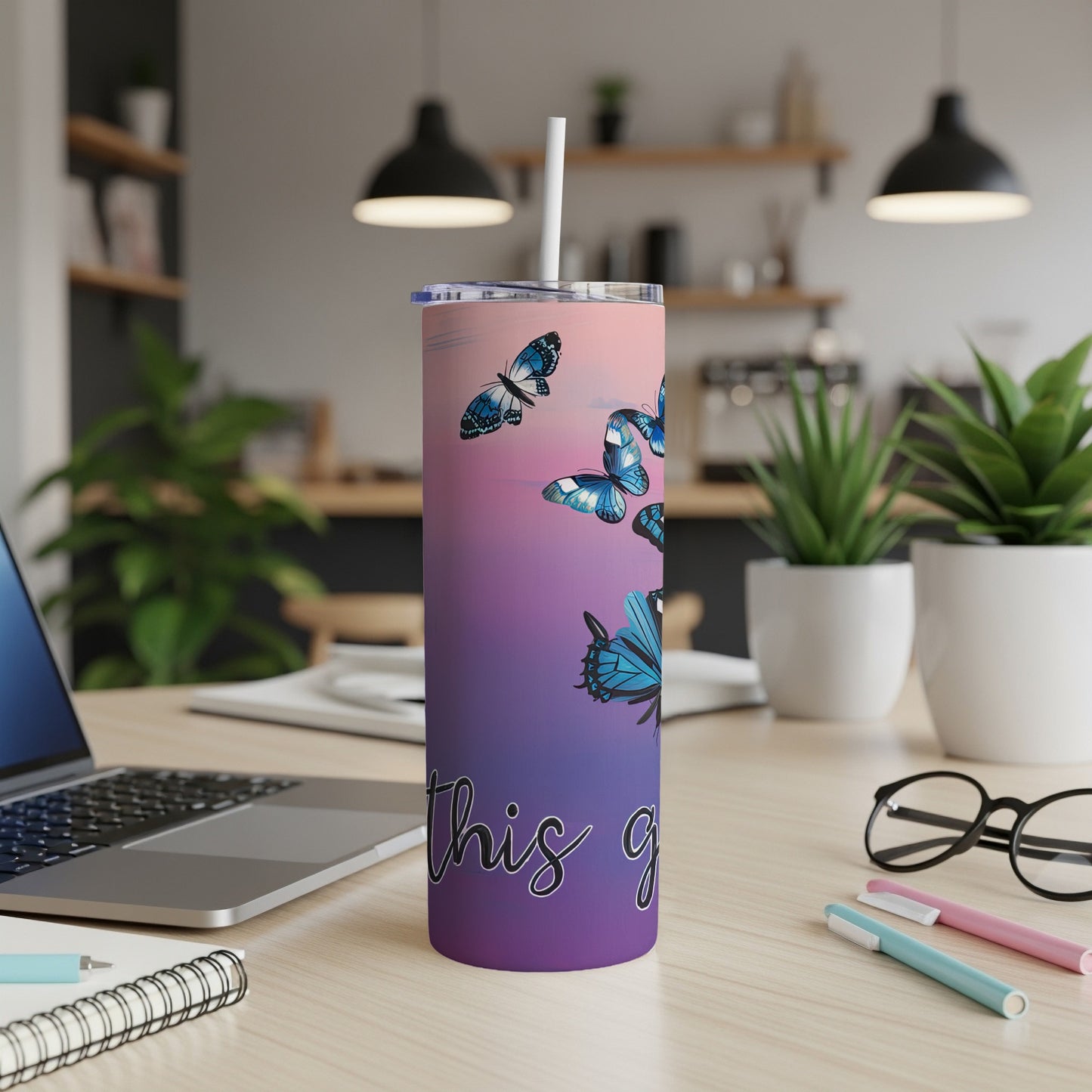Purple tumbler with blue butterflies and "this girl" text.