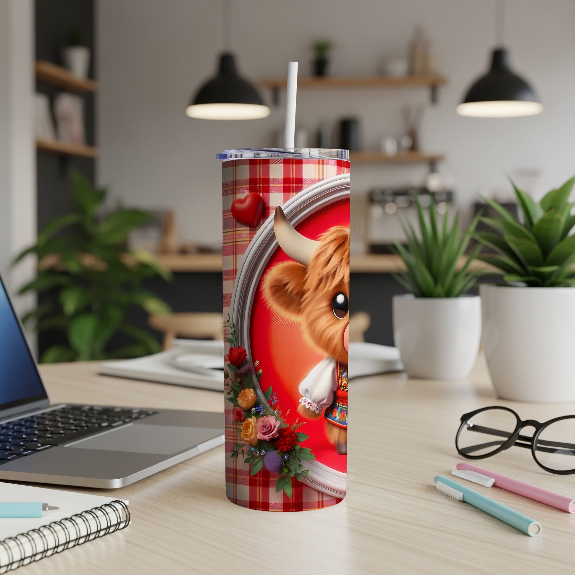 Tall tumbler with Highland cow, plaid, and floral design.