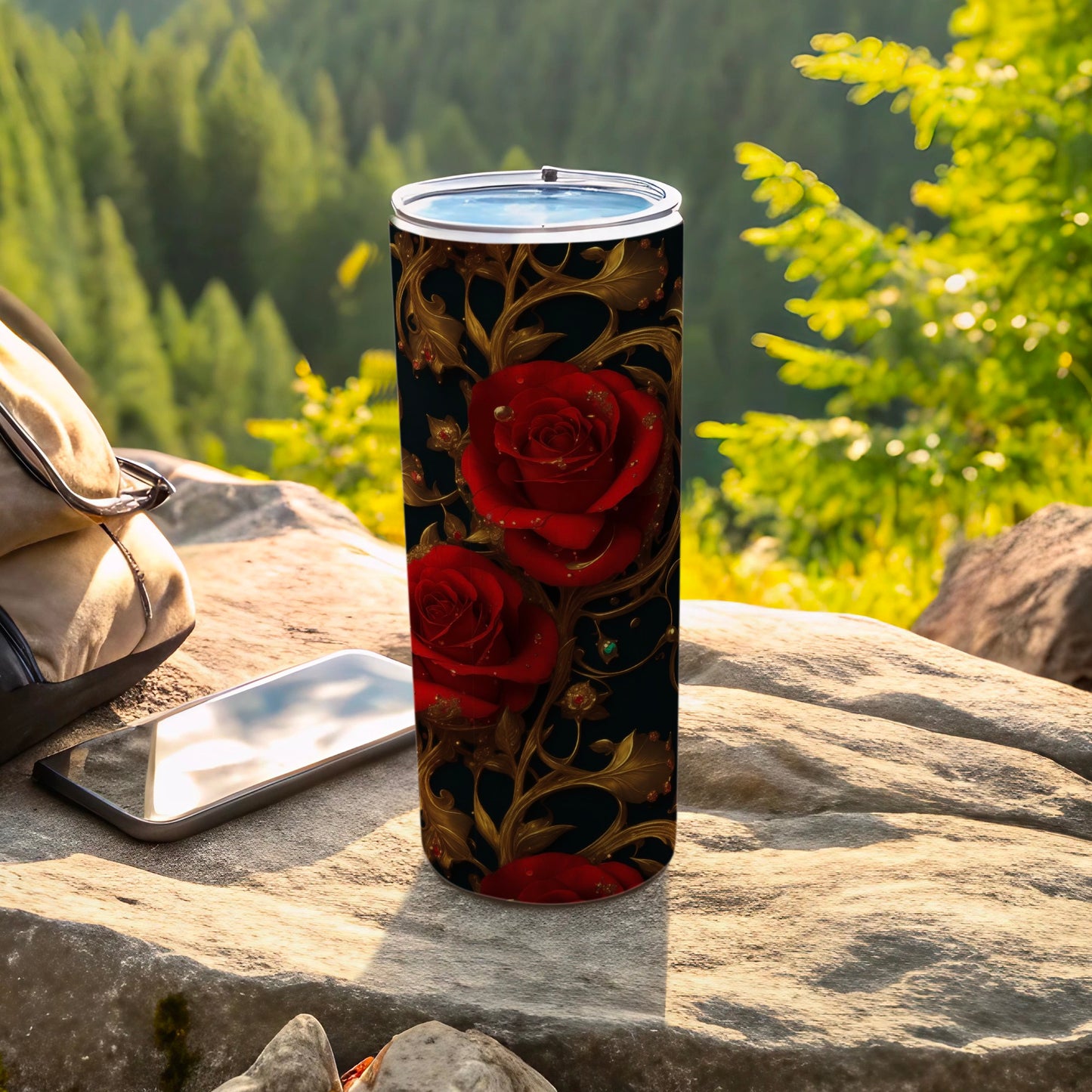 Red roses and gold scrollwork on a dark tumbler with a spill-proof lid.
