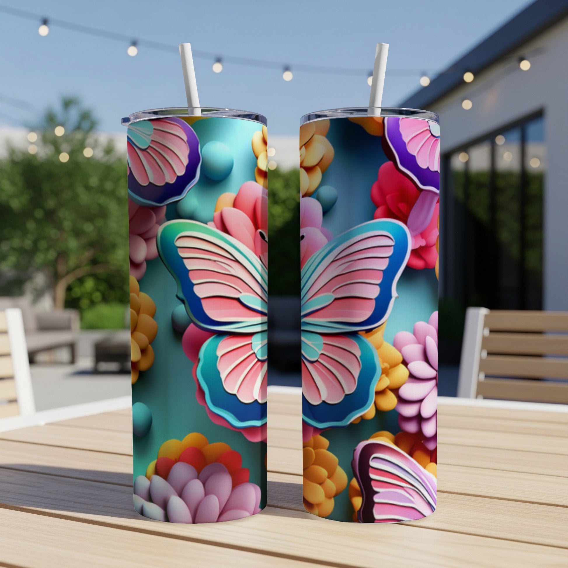 Two tumblers featuring a colorful butterfly and floral design.