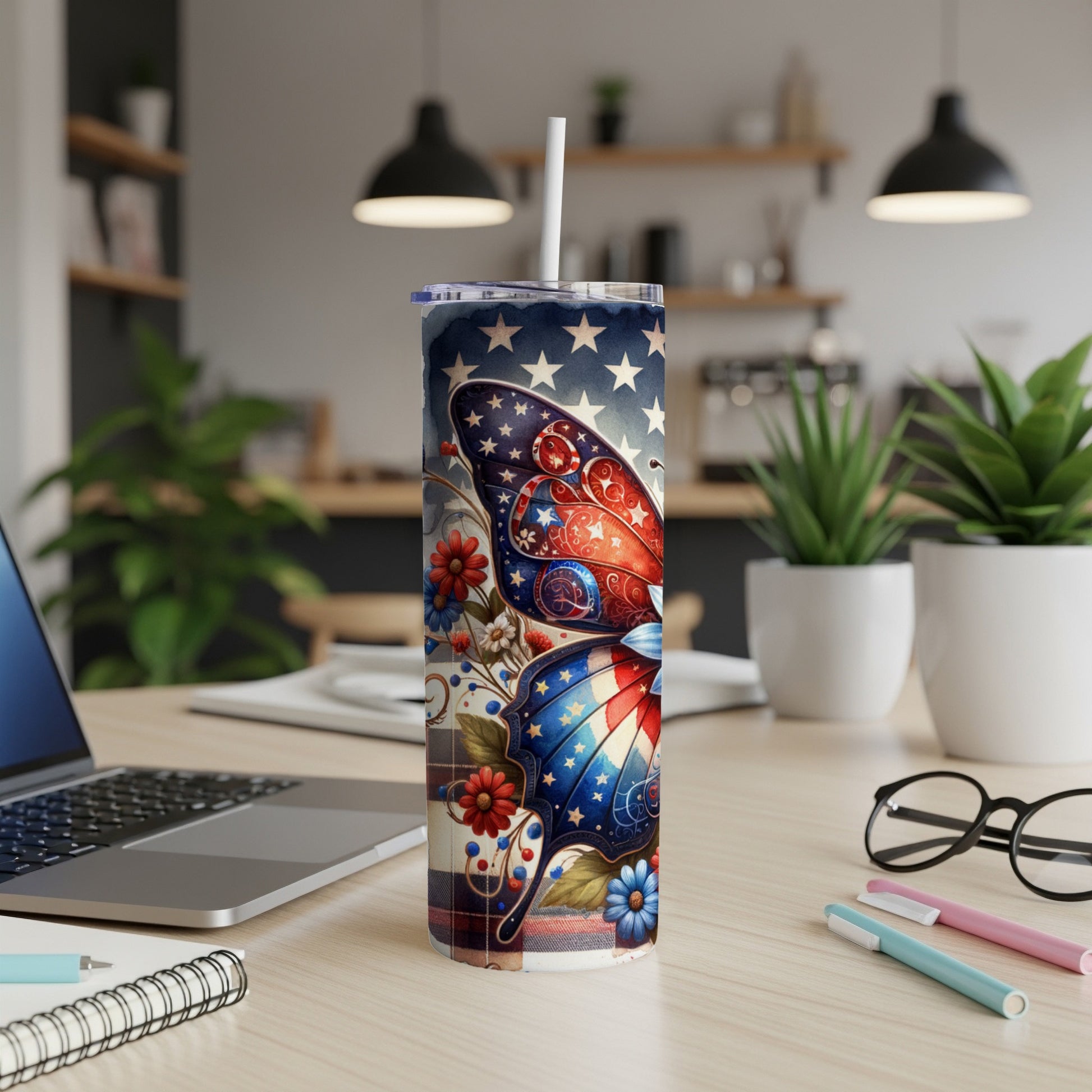 Butterfly tumbler with stars and stripes pattern and flowers.