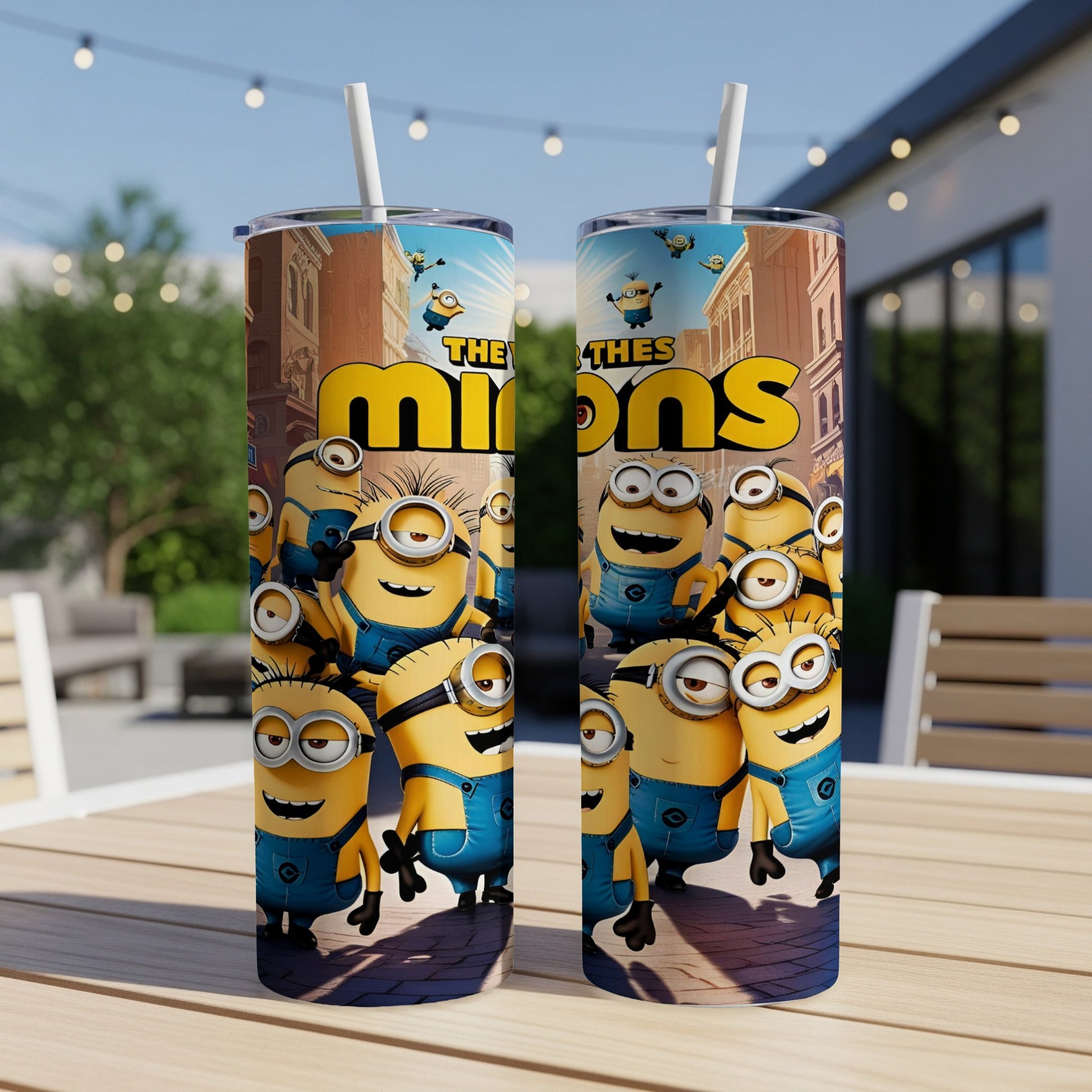 Two Minions tumblers featuring characters from The Minions Movie on a table.