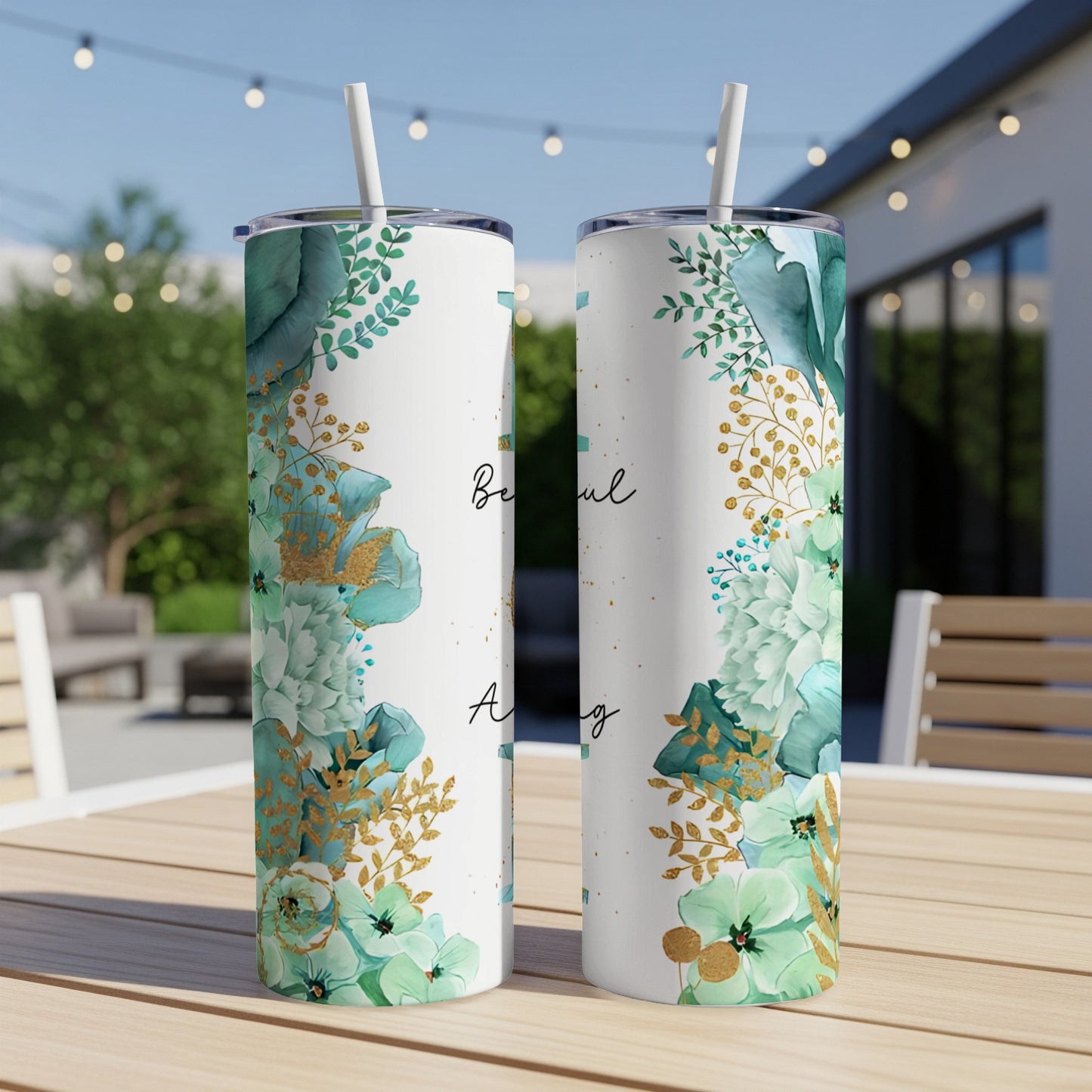 Two tumblers with floral design and handwritten text "Beautiful Amazing".