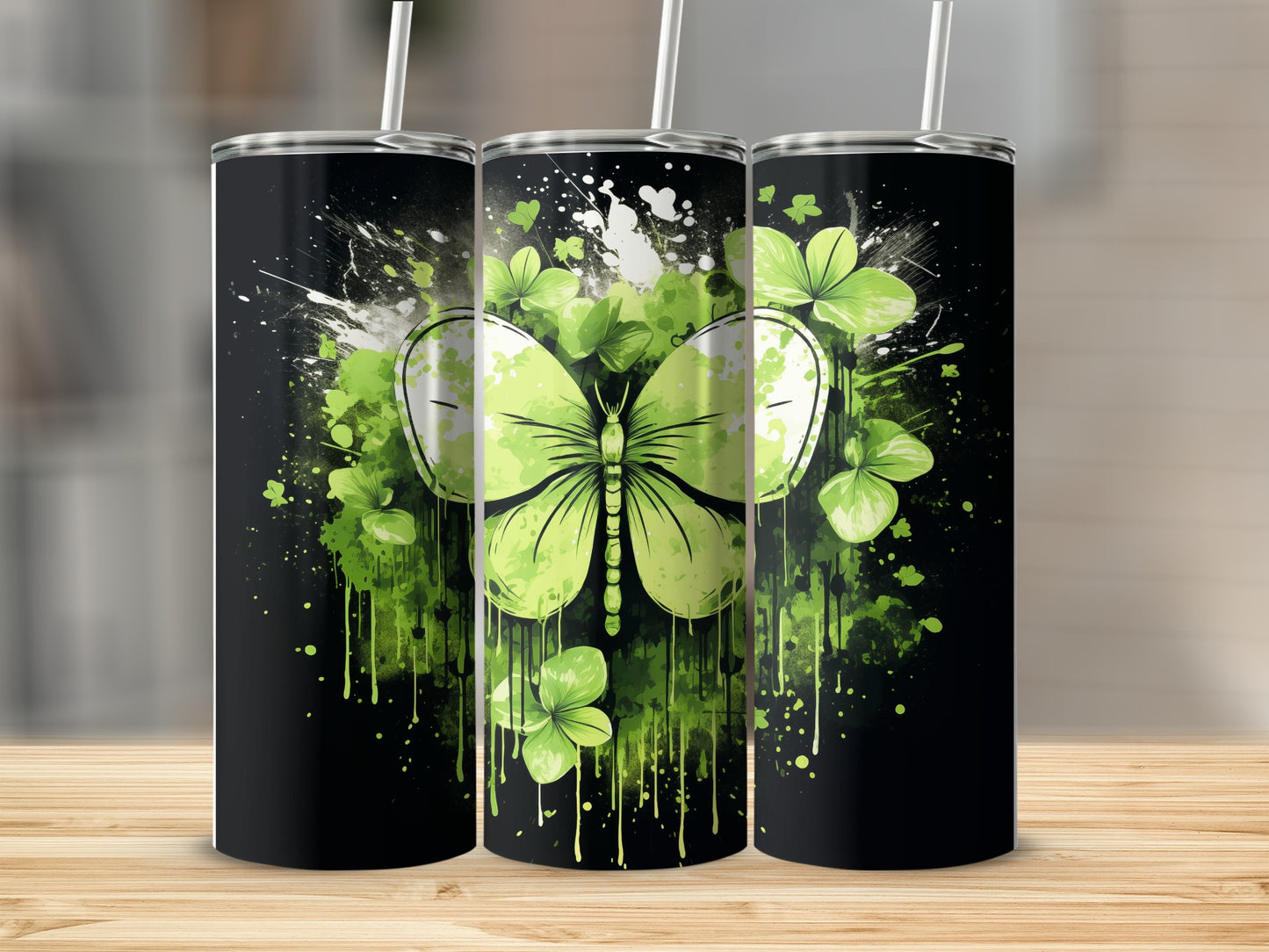 Green butterfly and shamrocks on a black background with splattered paint.
