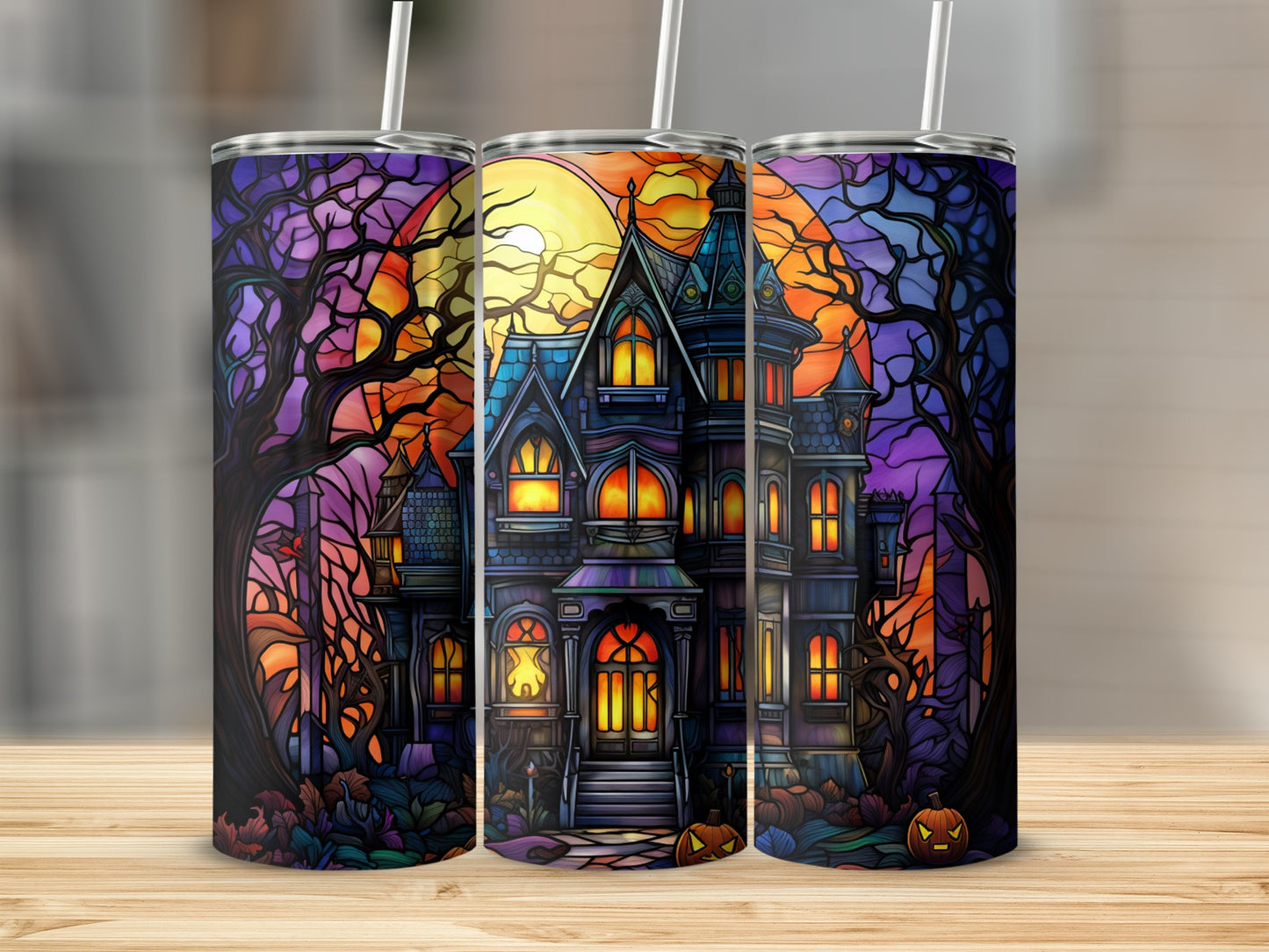 Stained glass-style haunted house with pumpkins and moon, against dark trees.