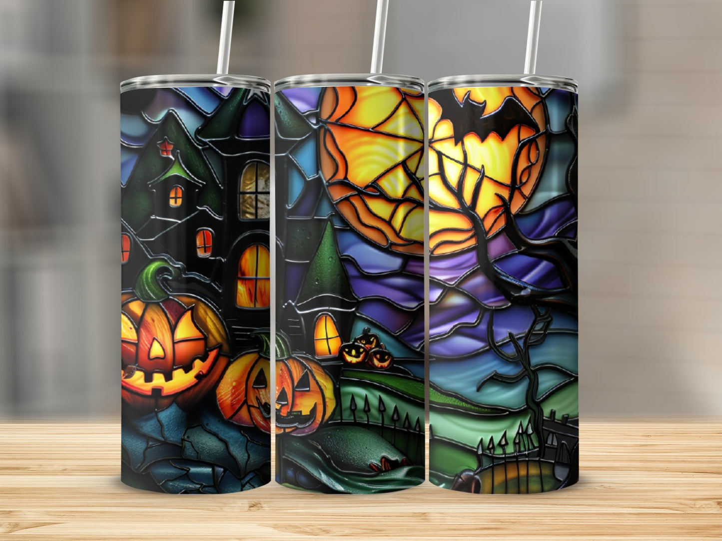 Halloween scene with pumpkins, haunted house, and full moon on a tumbler.