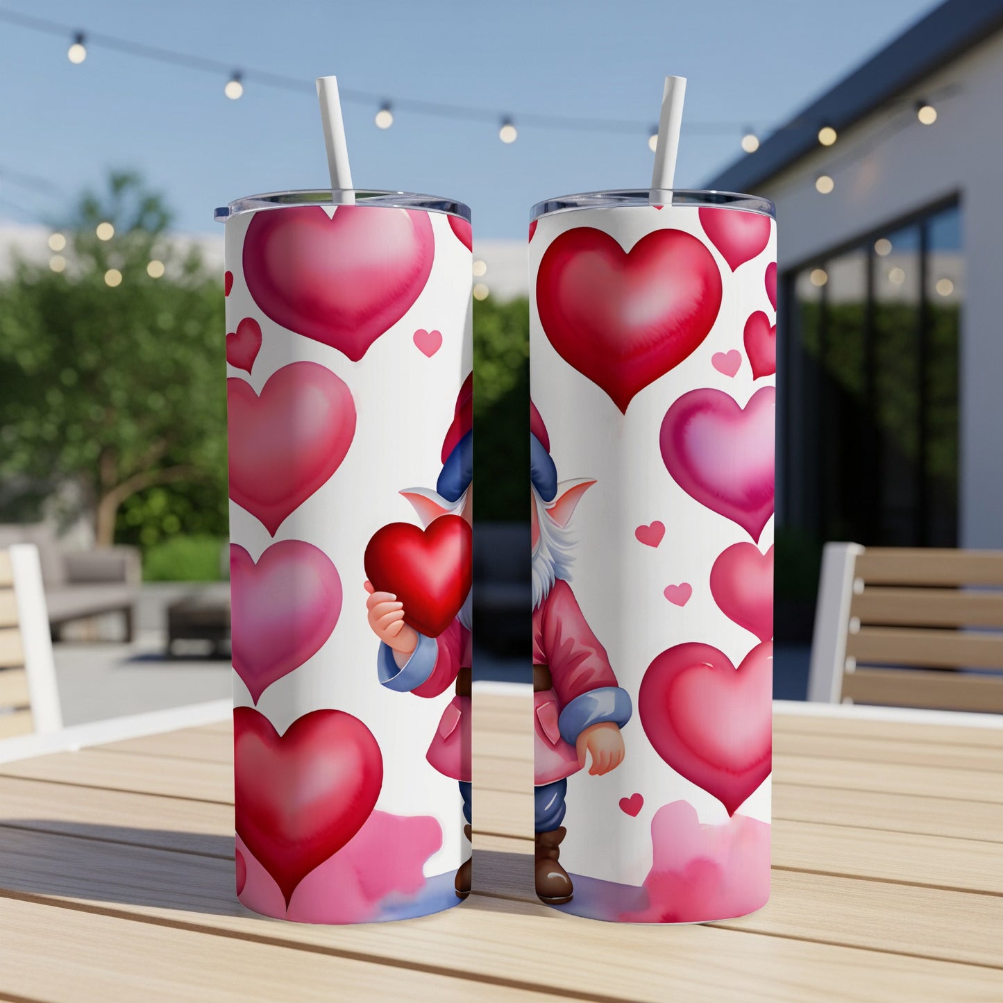 Two tumblers with a gnome holding a heart, surrounded by hearts.