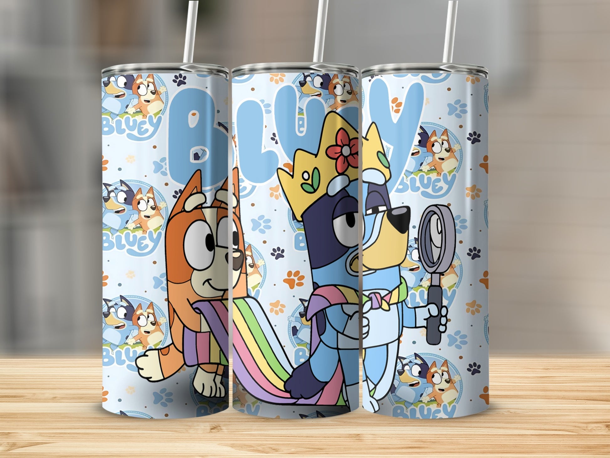 Three Bluey character tumblers with rainbow and magnifying glass designs.